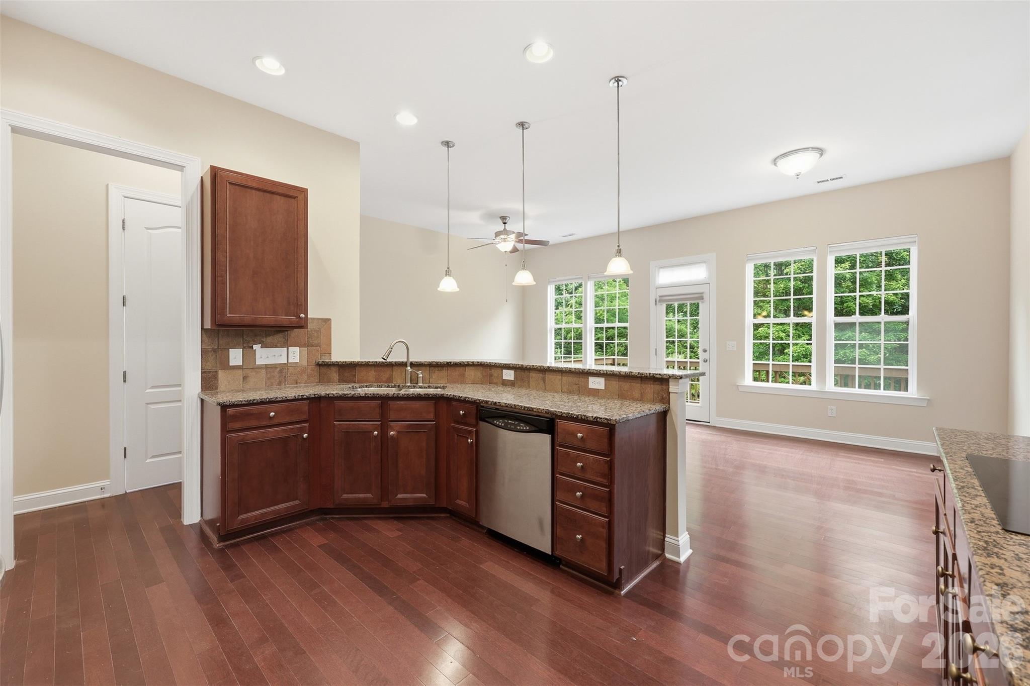 Open kitchen to breakfast nook - 878 Treasure Court, Fort Mill