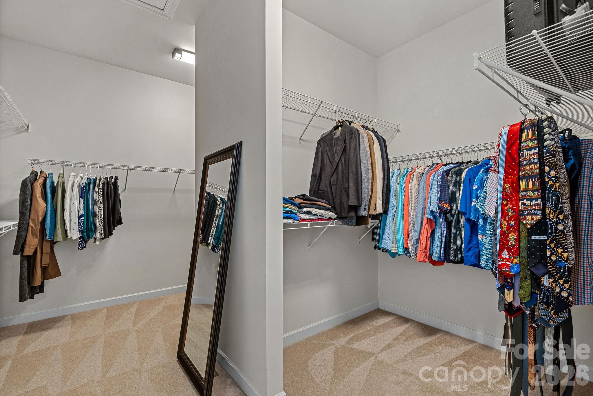Primary Double sided closet - 10654 Rippling Stream Drive NW, Concord