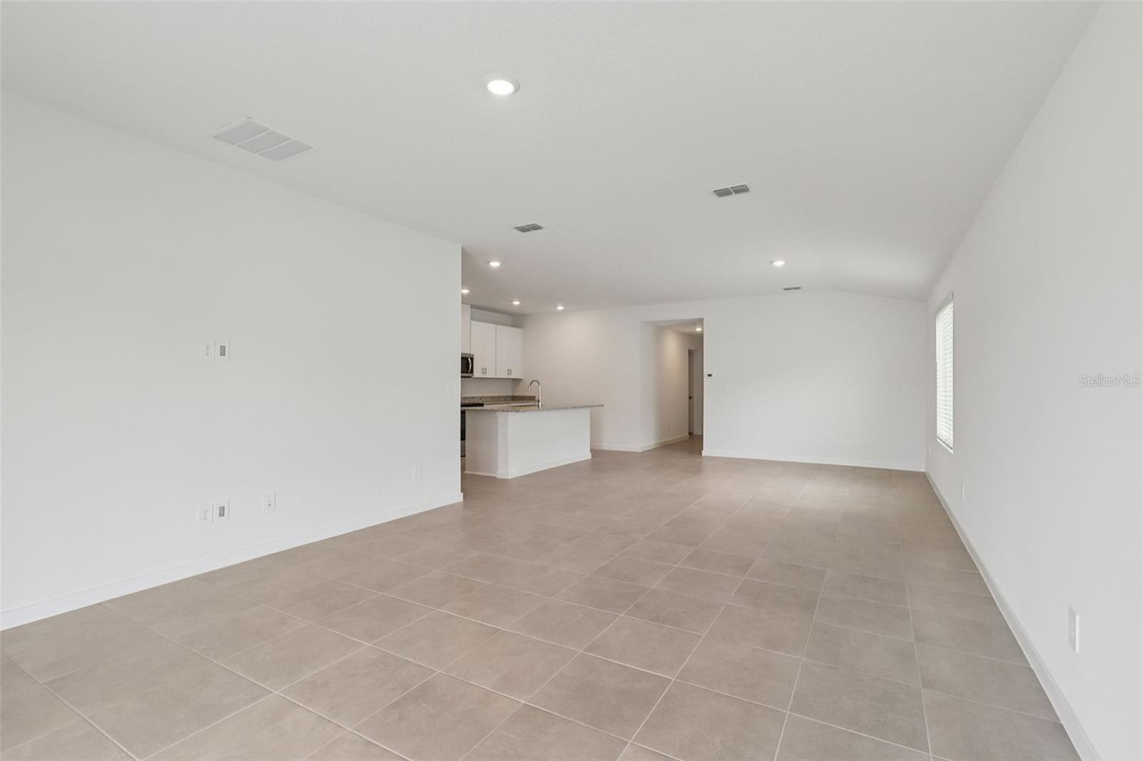 Photo is not of the actual home, but is an inspirational photo of builder’s model home and may depict options, furnishings, and/or decorator features that are not included. - 78 WANDERING CREEK WAY, PALM COAST