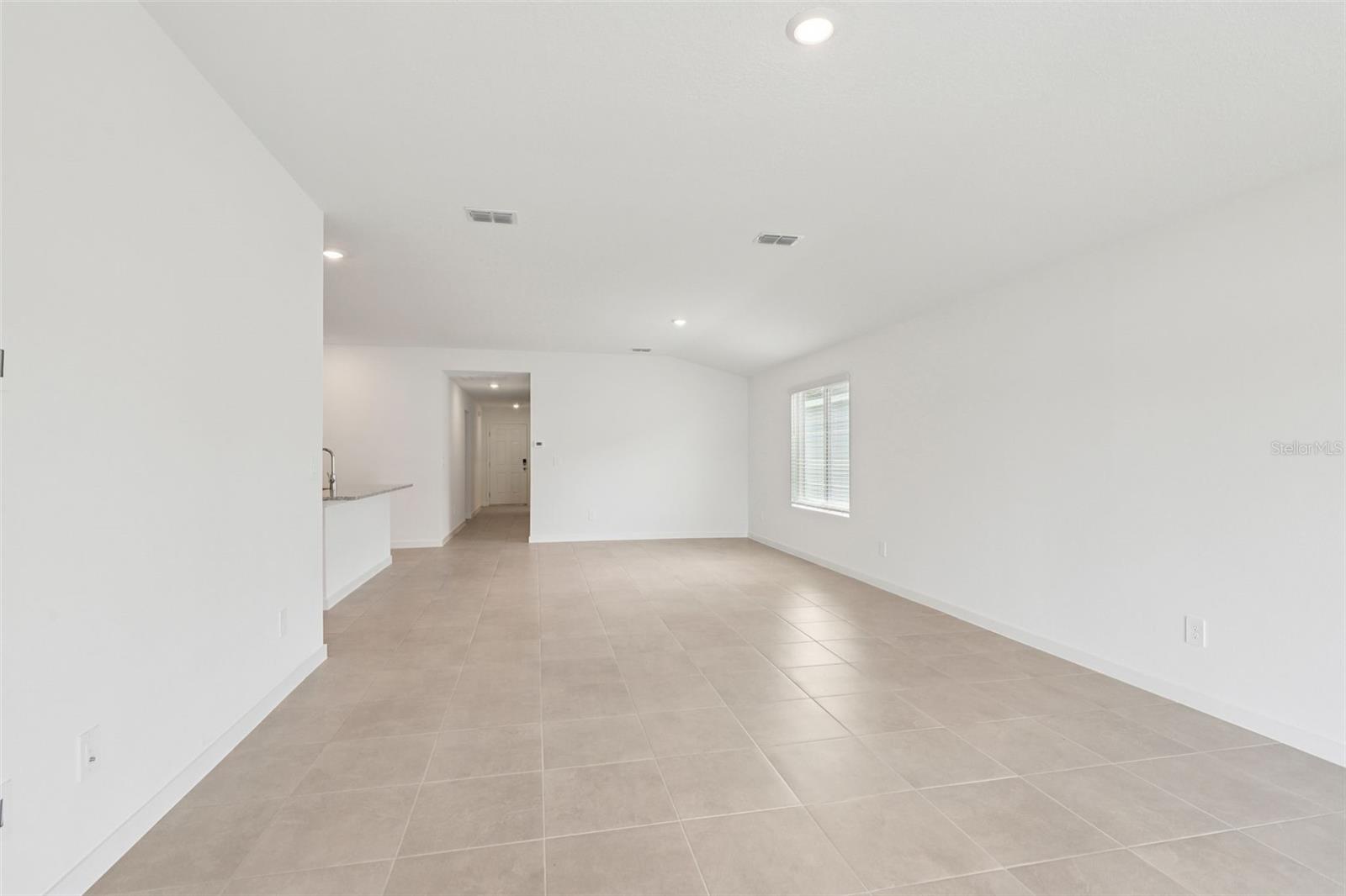 Photo is not of the actual home, but is an inspirational photo of builder’s model home and may depict options, furnishings, and/or decorator features that are not included. - 78 WANDERING CREEK WAY, PALM COAST