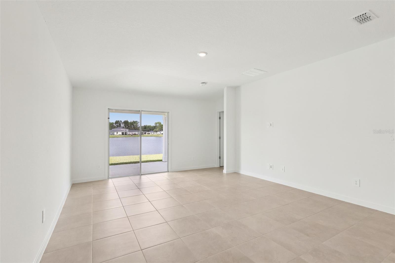 Photo is not of the actual home, but is an inspirational photo of builder’s model home and may depict options, furnishings, and/or decorator features that are not included. - 78 WANDERING CREEK WAY, PALM COAST