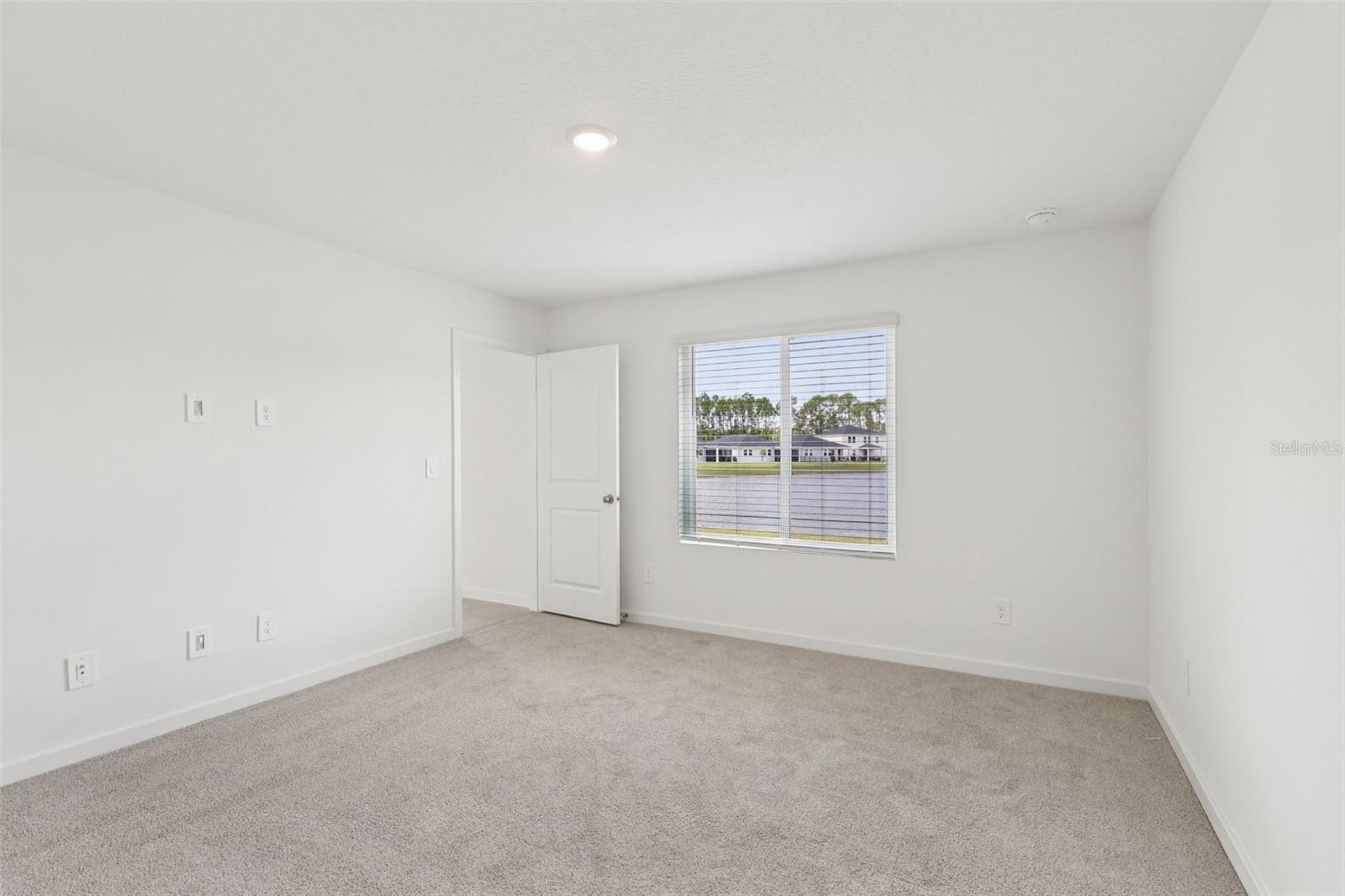 Photo is not of the actual home, but is an inspirational photo of builder’s model home and may depict options, furnishings, and/or decorator features that are not included. - 78 WANDERING CREEK WAY, PALM COAST