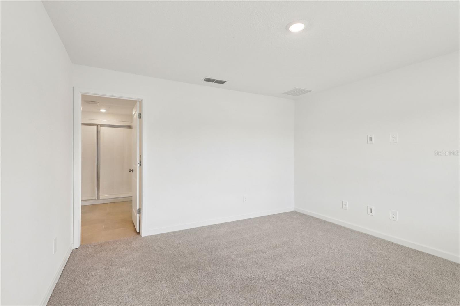 Photo is not of the actual home, but is an inspirational photo of builder’s model home and may depict options, furnishings, and/or decorator features that are not included. - 78 WANDERING CREEK WAY, PALM COAST