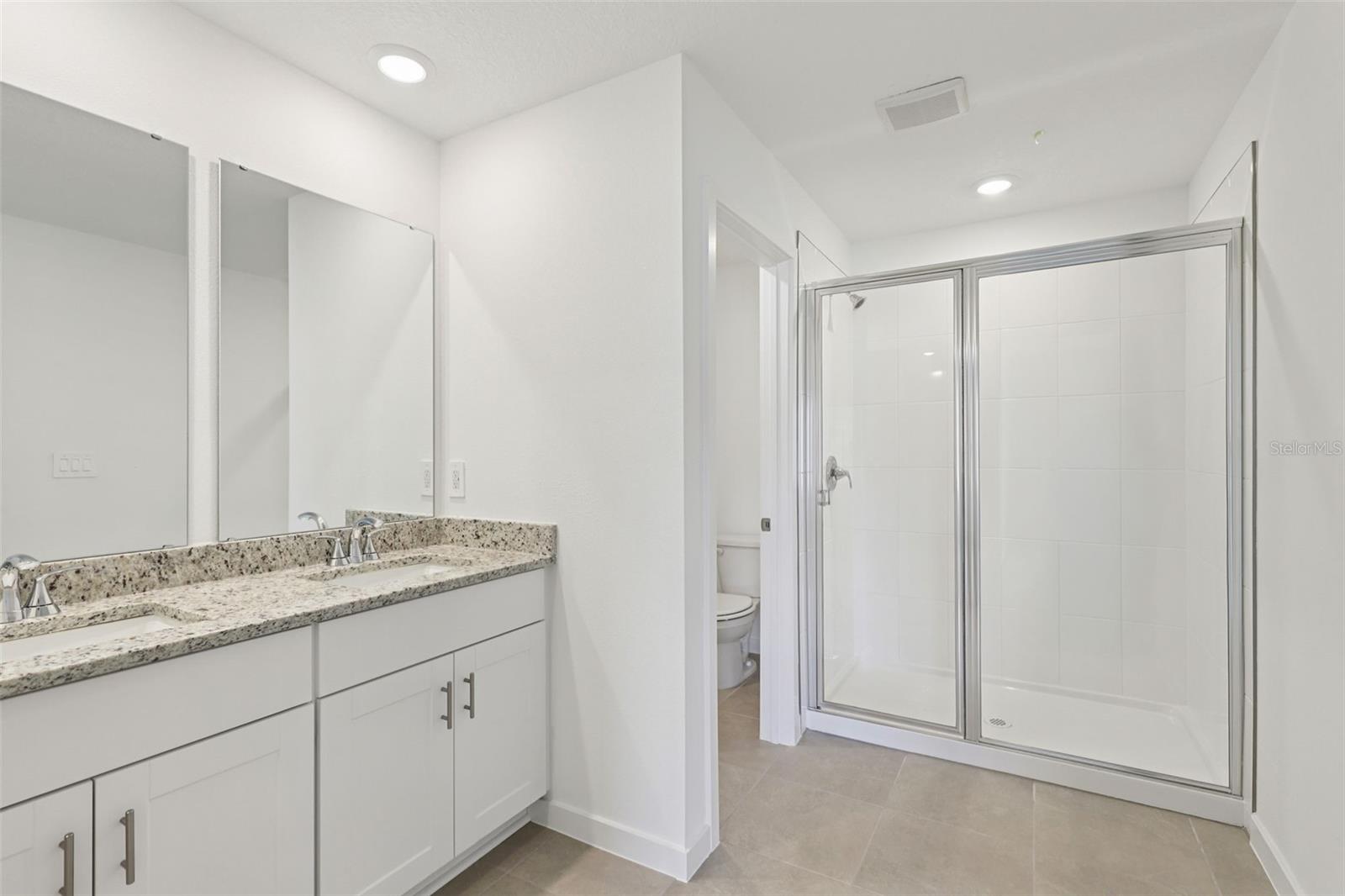 Photo is not of the actual home, but is an inspirational photo of builder’s model home and may depict options, furnishings, and/or decorator features that are not included. - 78 WANDERING CREEK WAY, PALM COAST