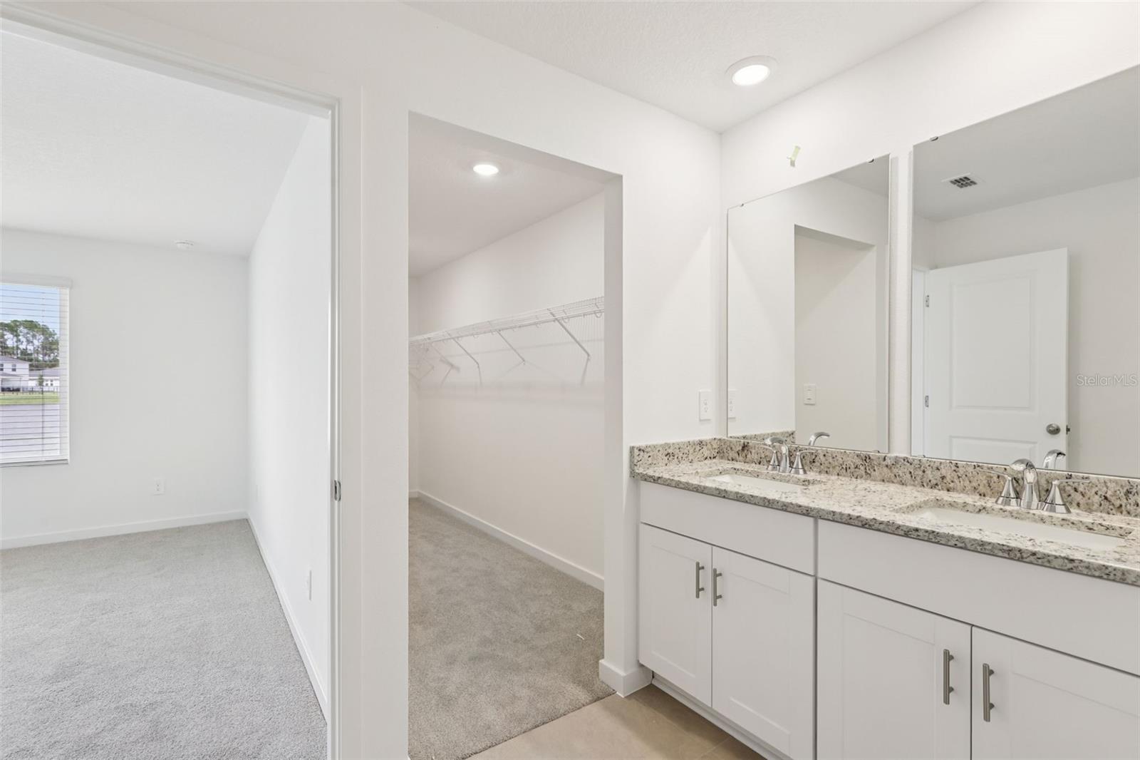 Photo is not of the actual home, but is an inspirational photo of builder’s model home and may depict options, furnishings, and/or decorator features that are not included. - 78 WANDERING CREEK WAY, PALM COAST