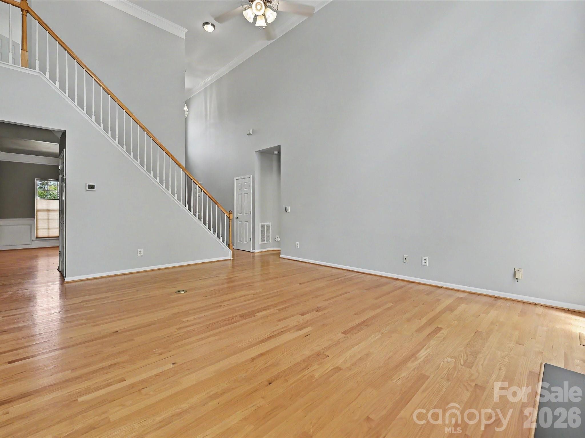 Great room with hardwoods, ceiling fan, fireplace - 152 Lighthouse Road, Mount Holly