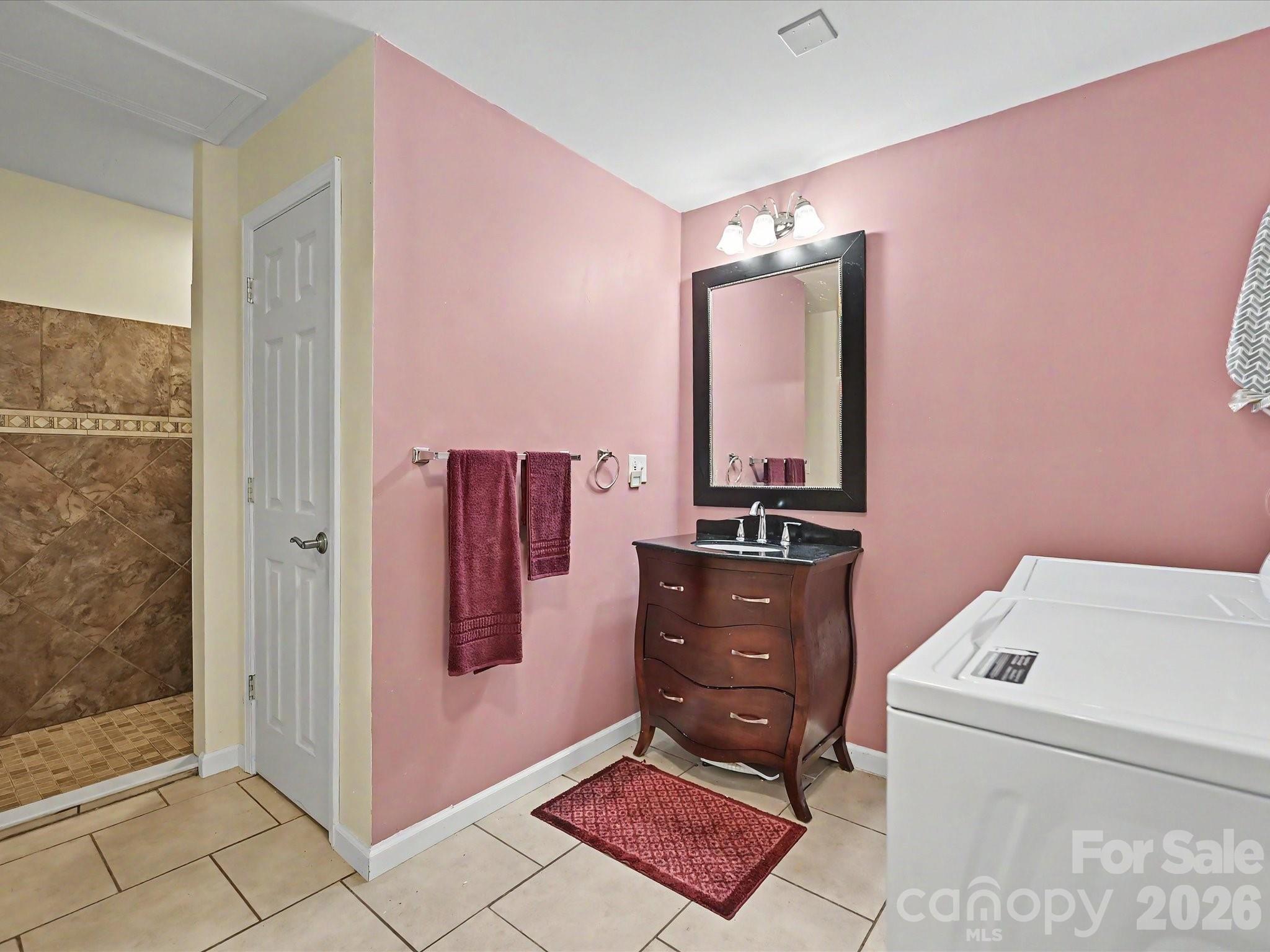 Basement level full bath also has laundry hookups - 152 Lighthouse Road, Mount Holly