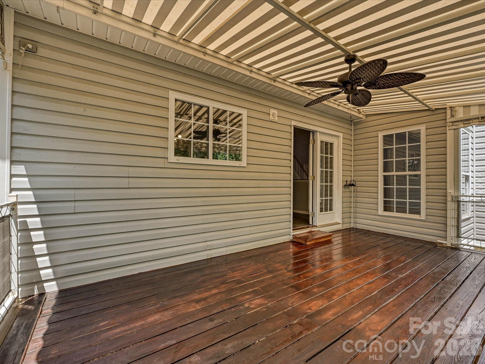 Deck with ceiling fan and hammock hooks - 152 Lighthouse Road, Mount Holly