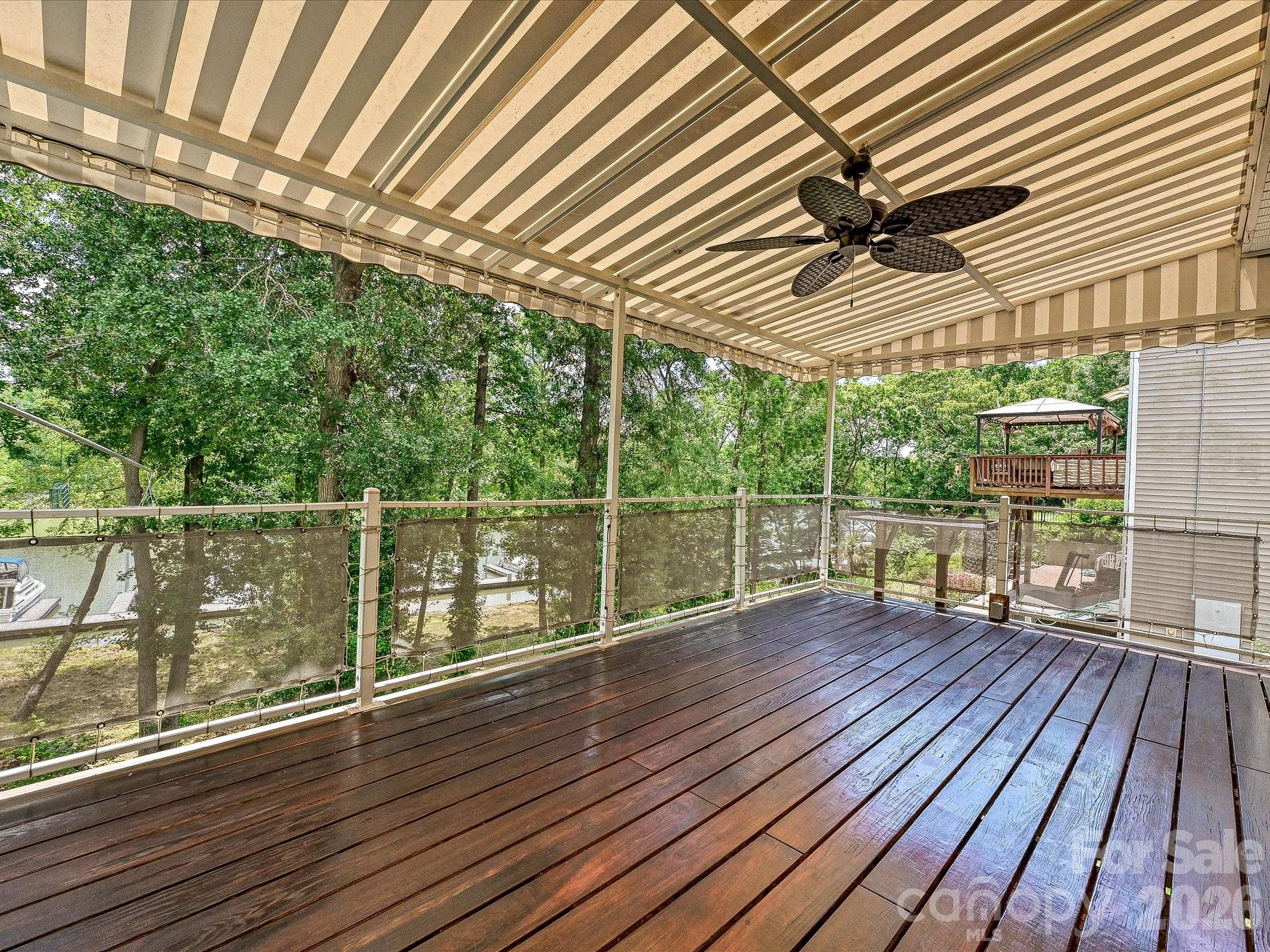 Deck with awning and canvas attached to railing - 152 Lighthouse Road, Mount Holly