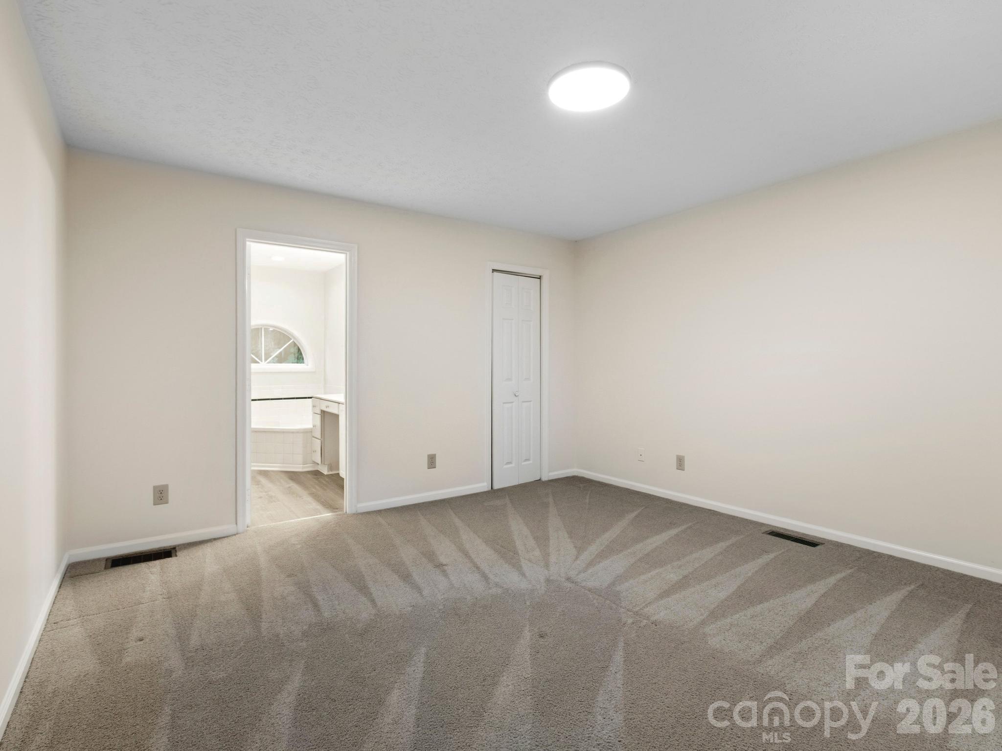 Primary bedroom on main with en suite - 44 Leisure Mountain Road, Asheville