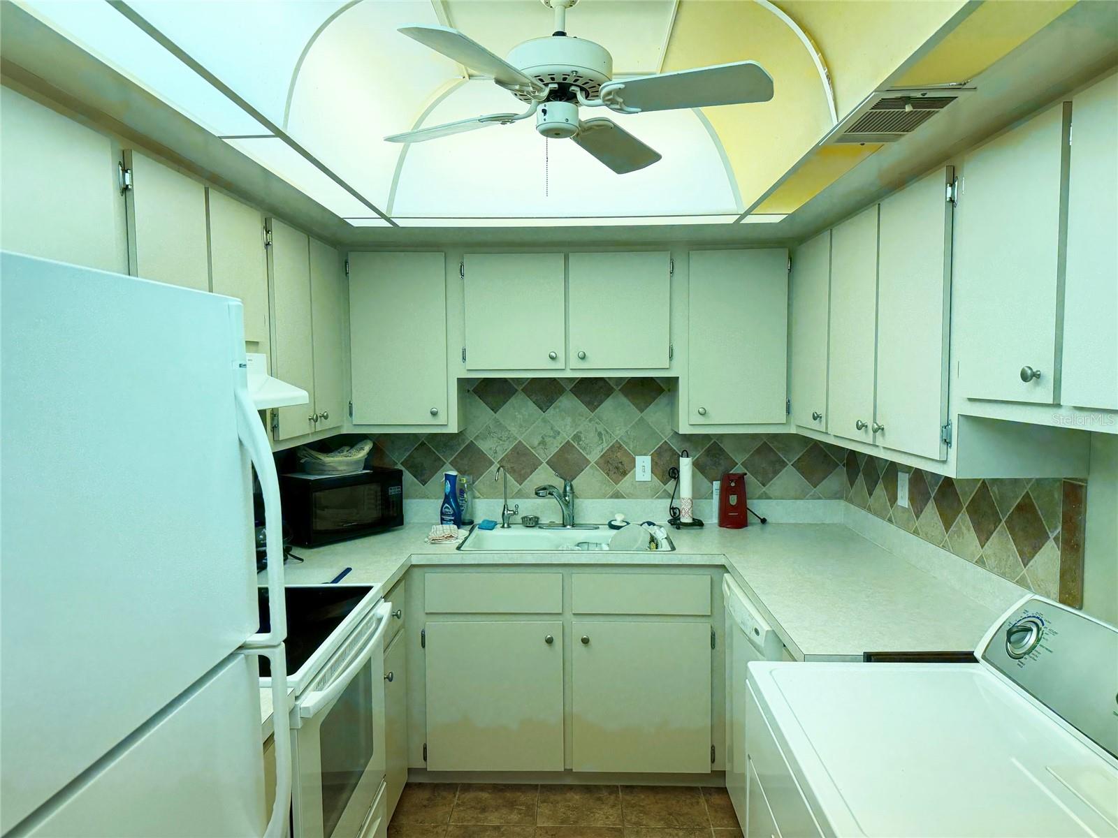 Kitchen and Laundry - 56 CLUB HOUSE DR #101, PALM COAST