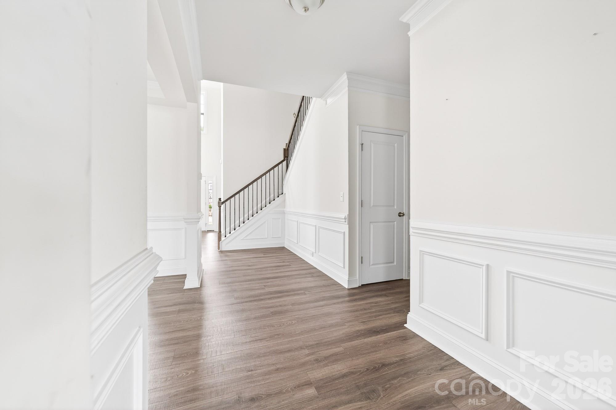 Wide hallway leading to the kitchen and den area - 5972 Redwood Pine Road, Concord