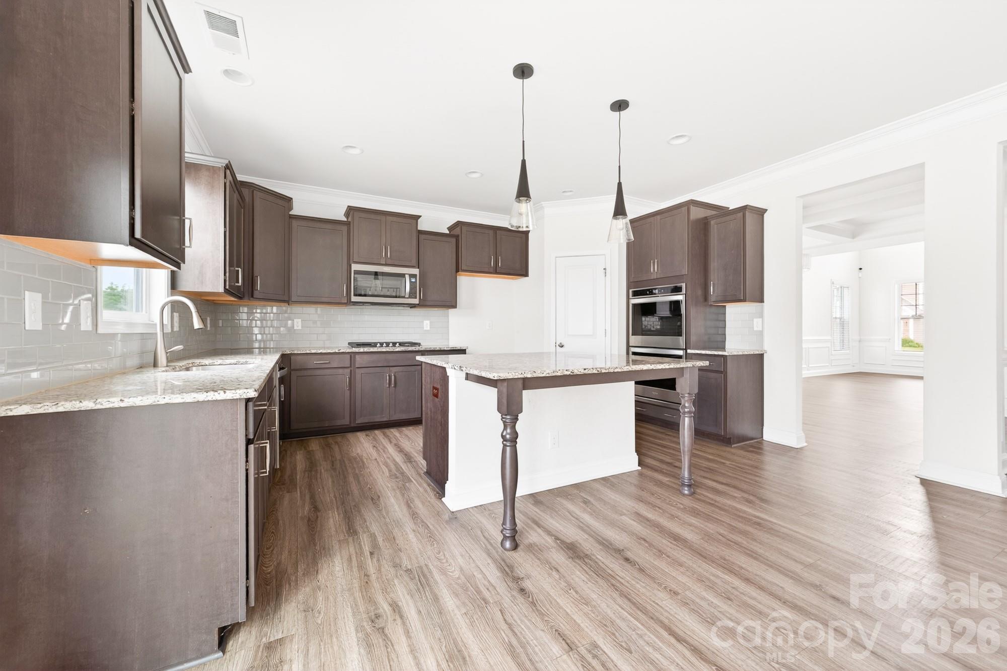 Tile backsplash and a large pantry for extra storage - 5972 Redwood Pine Road, Concord