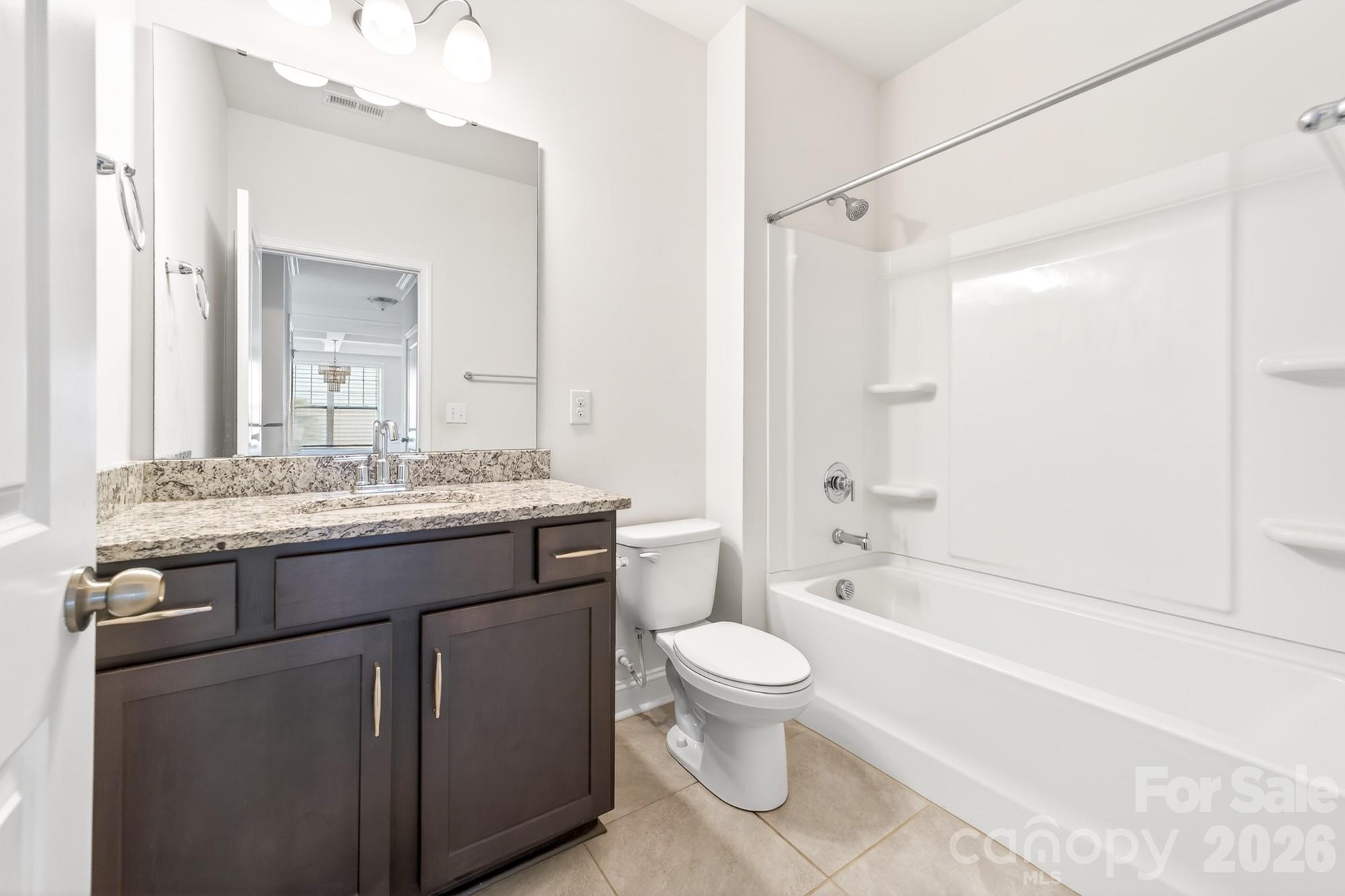 Main floor full bath located right beside the mail floor bedroom - 5972 Redwood Pine Road, Concord