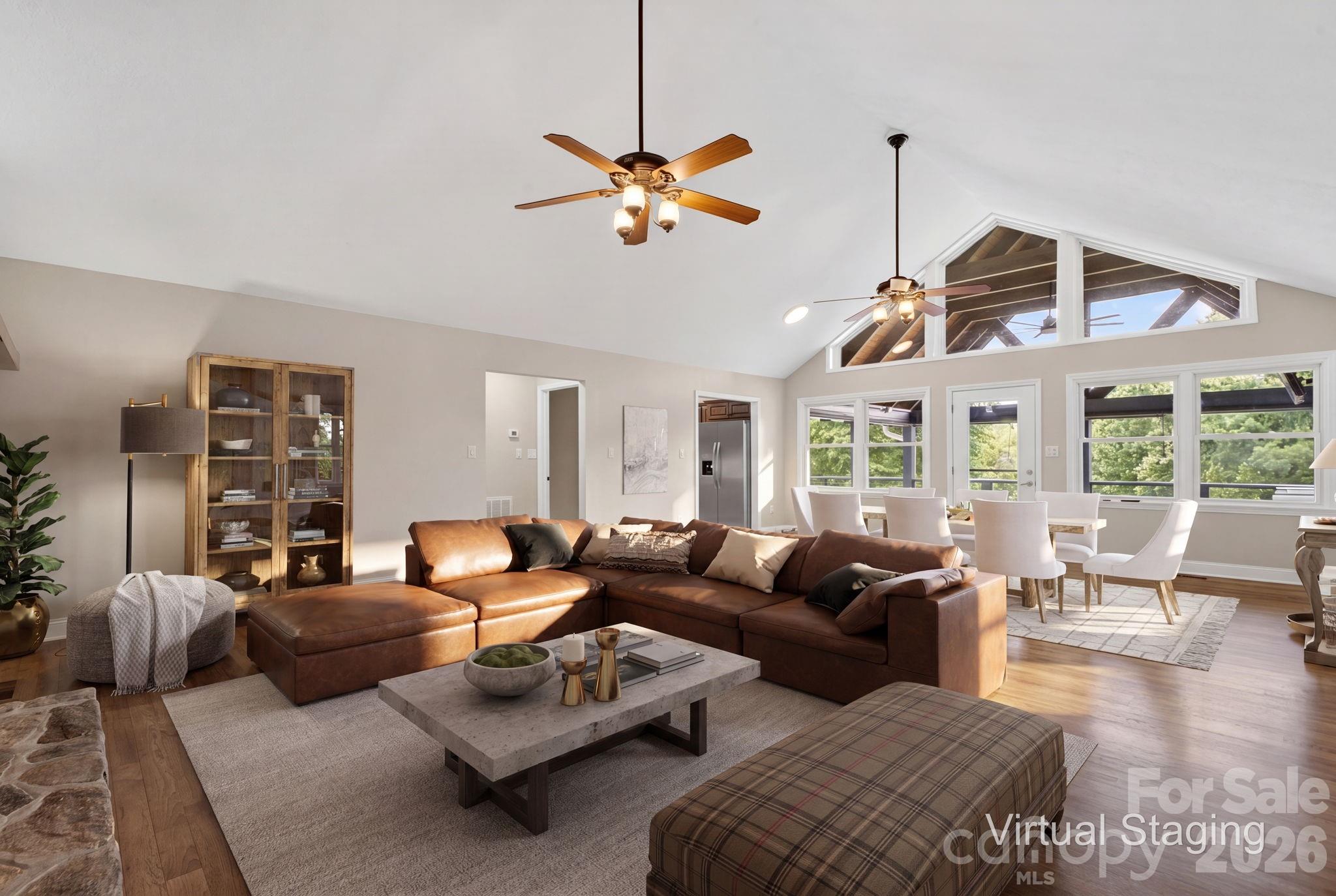 Virtually staged family room and dining area - 97 Whippoorwill Lane, Fairview
