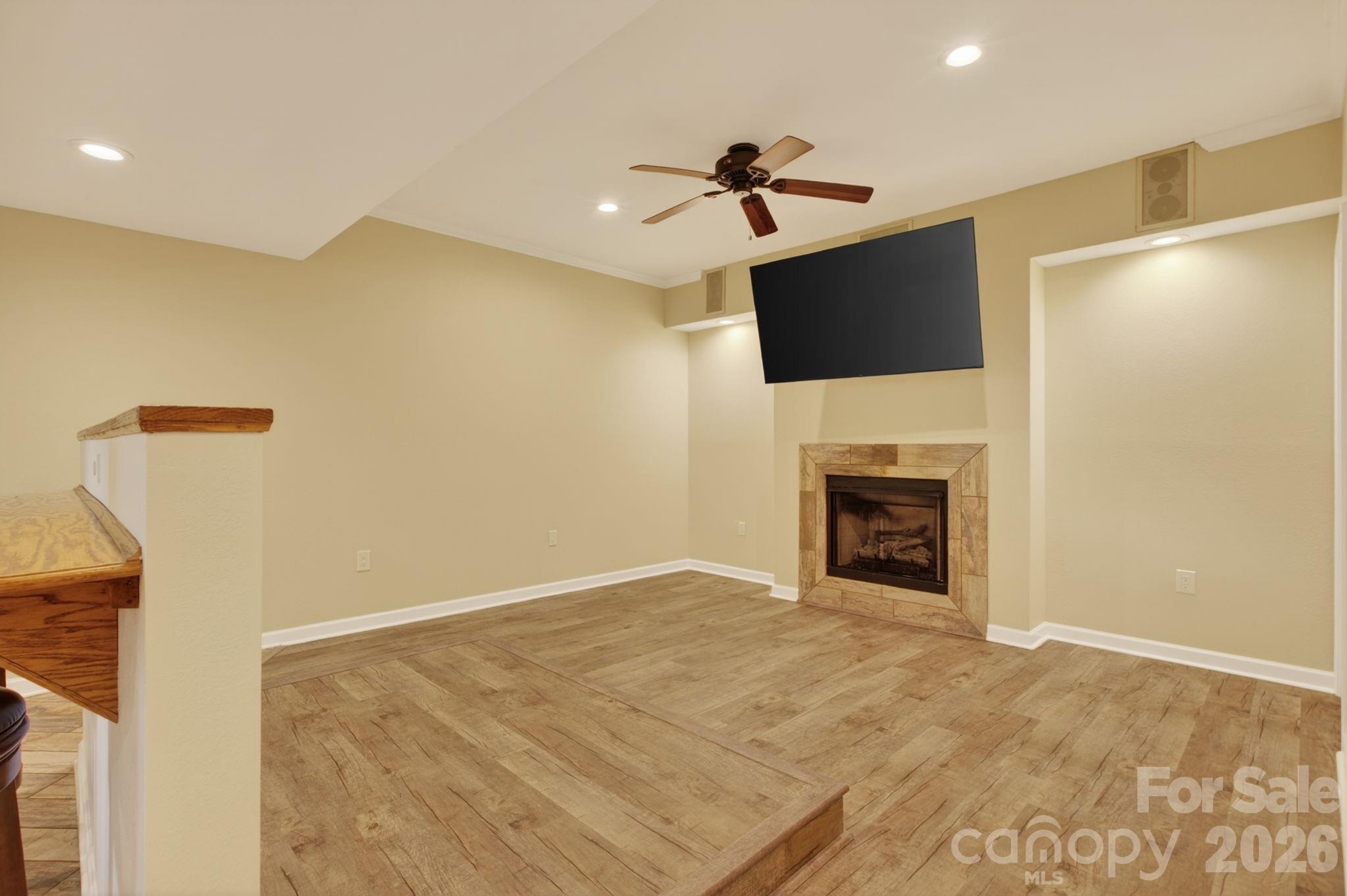 Media room with gas log fireplace - 97 Whippoorwill Lane, Fairview