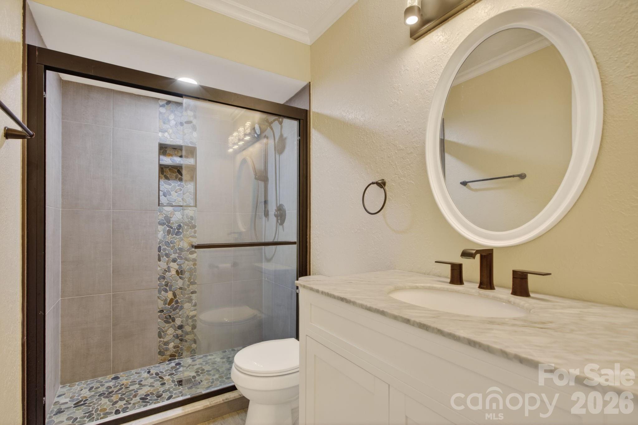 Guest bathroom on main level custom tile shower - 97 Whippoorwill Lane, Fairview