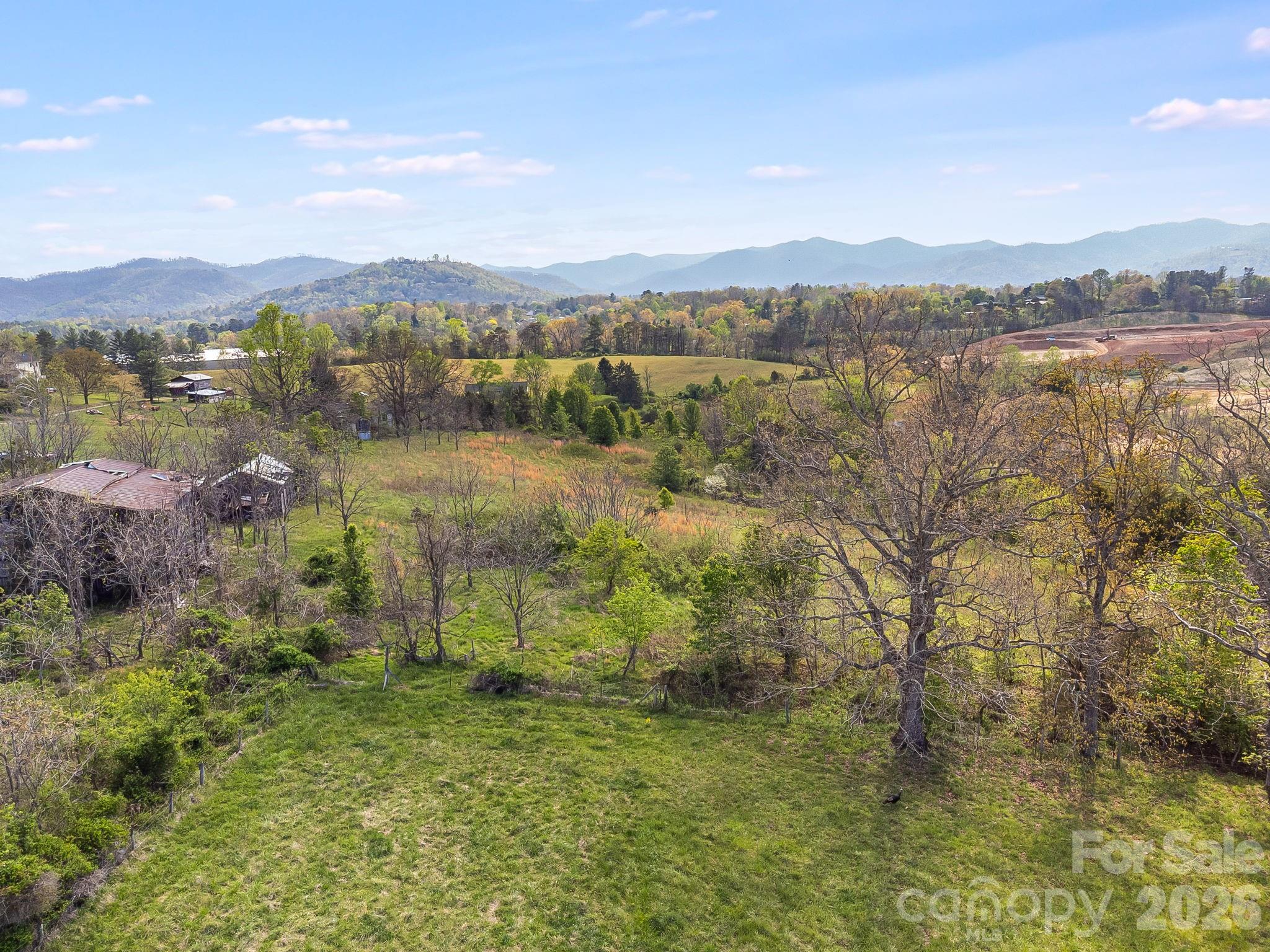 Whether you're a developer seeking your next project or a buyer looking for acreage in a prime location, this property delivers exceptional potential. - 47 Gill Branch Road, Weaverville