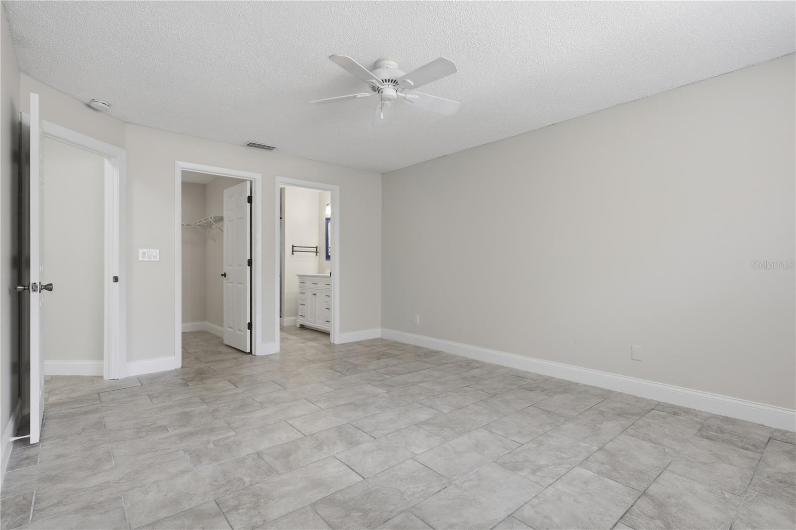 Owners suite with tile flooring - 44 CAPTAINS WALK, PALM COAST
