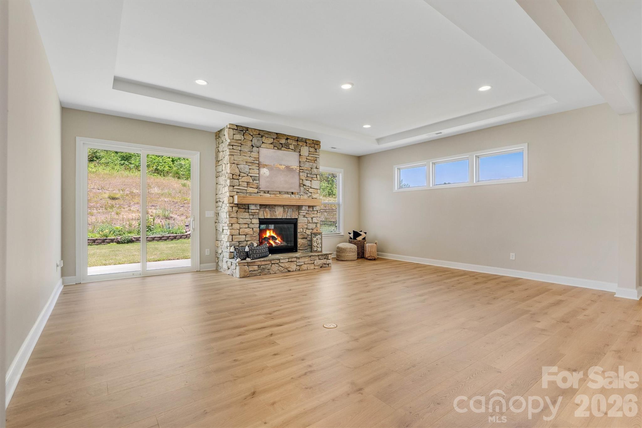 Light-filled, neutral living spaces designed to complement your style (Virtually Staged Fire) - 8091 Woodline Lane, Denver