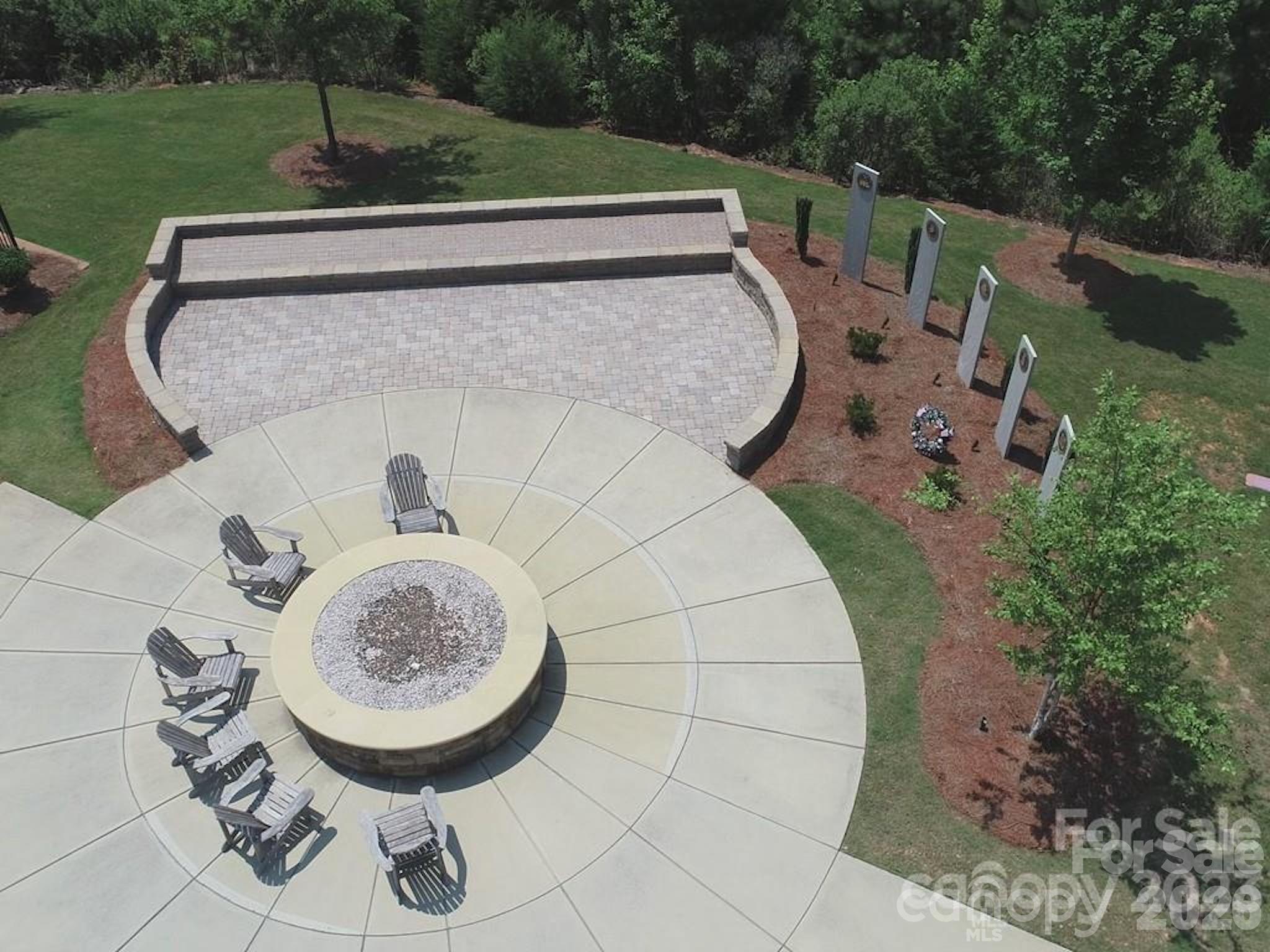 Sun City Carolina Lakes honors its Veterans with a memorial garden and a comfortable place to relax. - 3016 Chipper Court, Indian Land