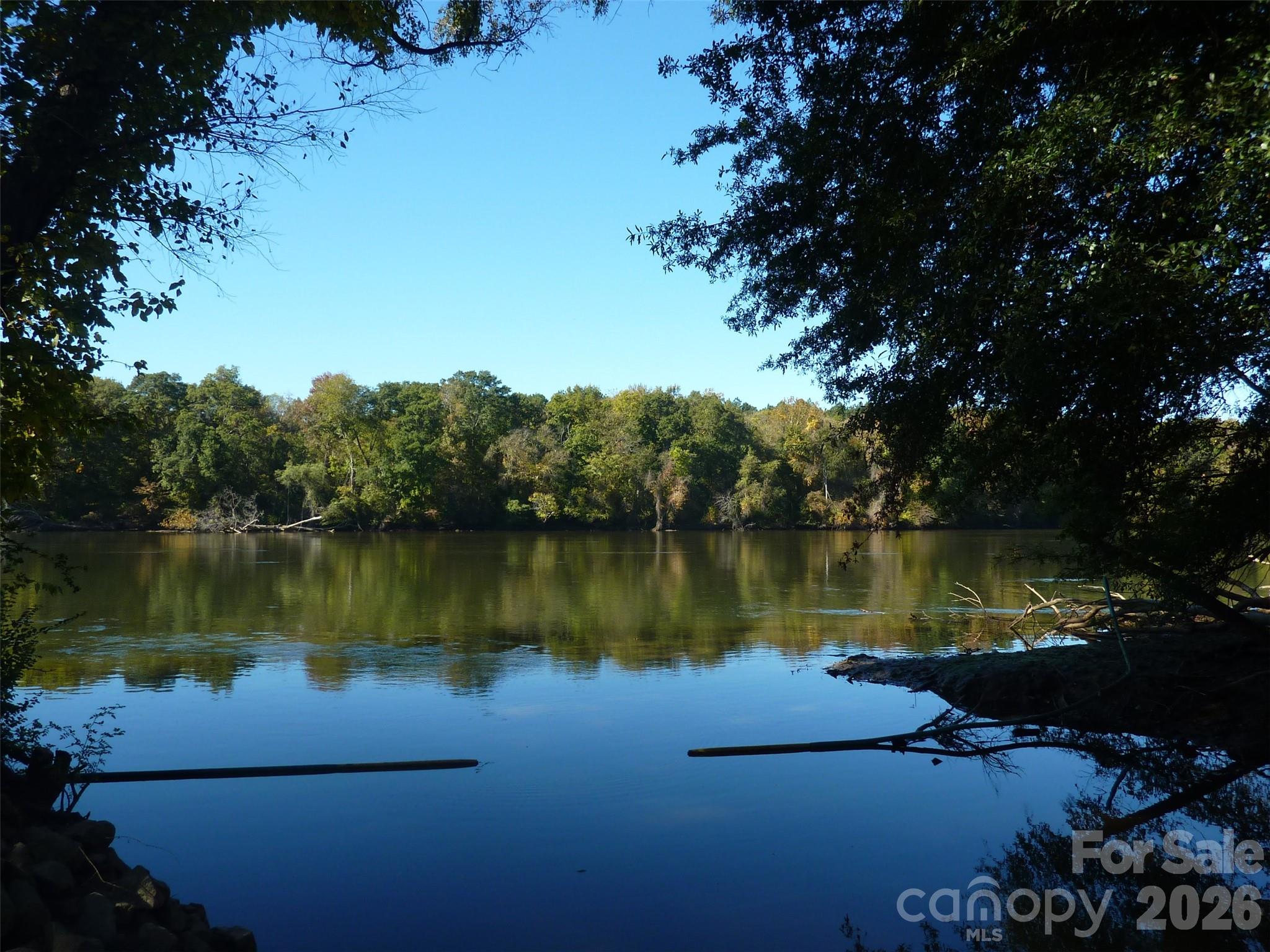 Catawba River access near the kayak center is reached via delightful walk or golf-cart ride along a tree-lined trail near Water's Edge Park. - 3016 Chipper Court, Indian Land