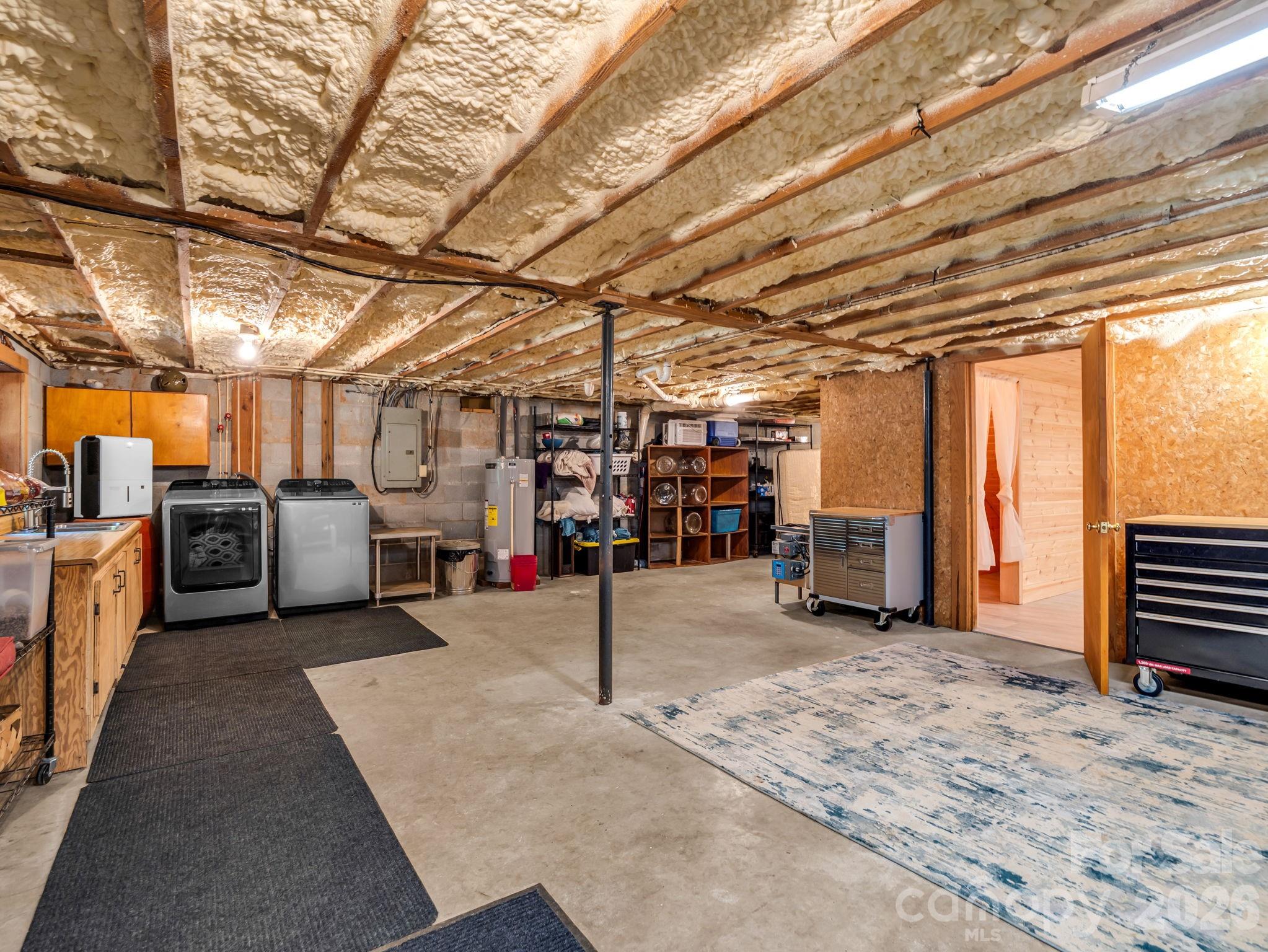 Unfinished area in the basement for expansion or storage! - 670 Cedar Creek Road, Lake Lure