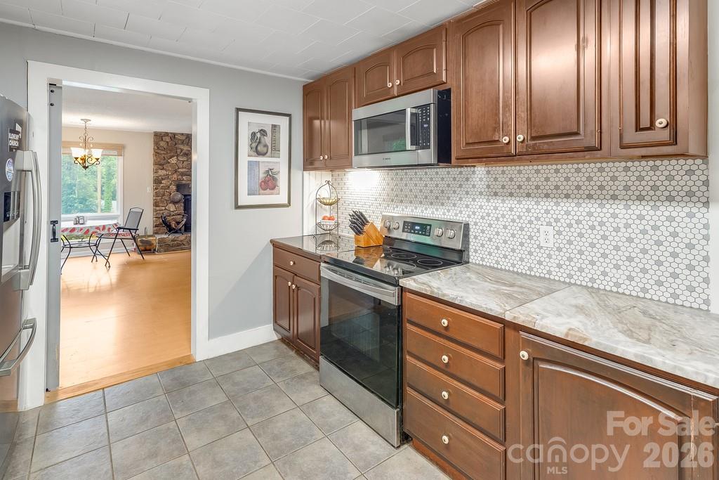 Single Family Residence at 3 Odie Lane, Candler, photo 12 of 43