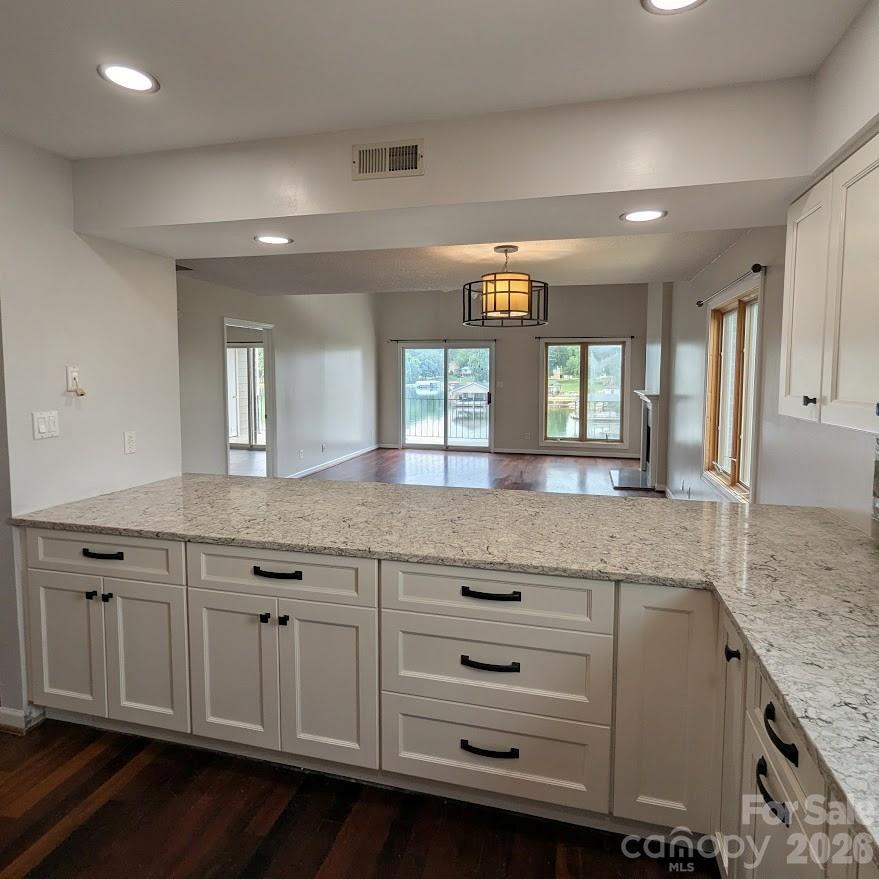 Beautiful new cabinets with drawer storage and granite countertops. - 100 Northshore Court, Cherryville