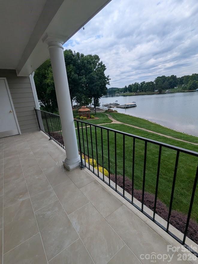 New tile on the covered porch. Great views. - 100 Northshore Court, Cherryville