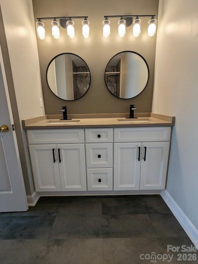 NEW sinks, lighting, floors and cabinet in the primary bathroom. - 100 Northshore Court, Cherryville
