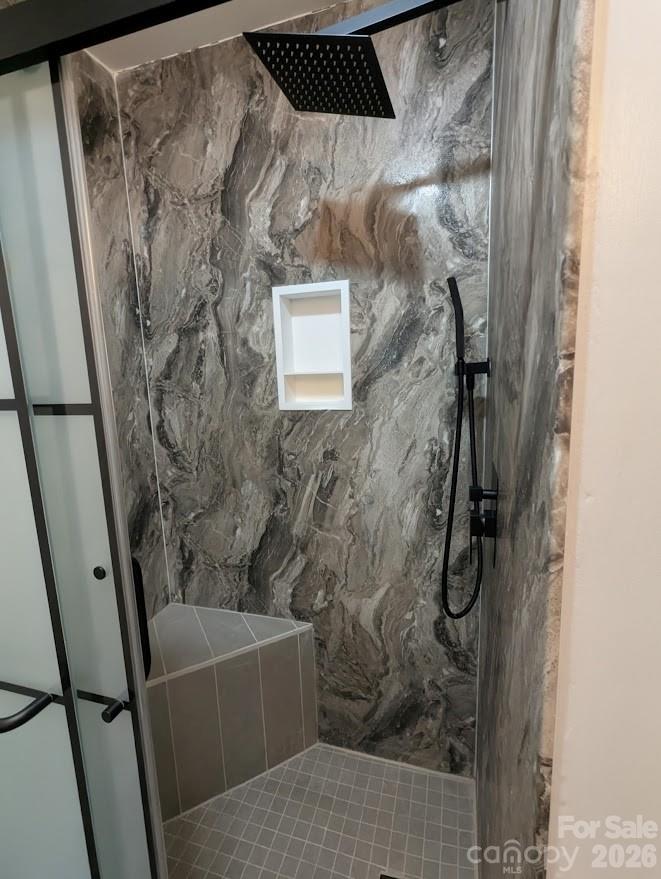 New walk in shower with rain showerhead and bench in the 2nd bathroom. - 100 Northshore Court, Cherryville