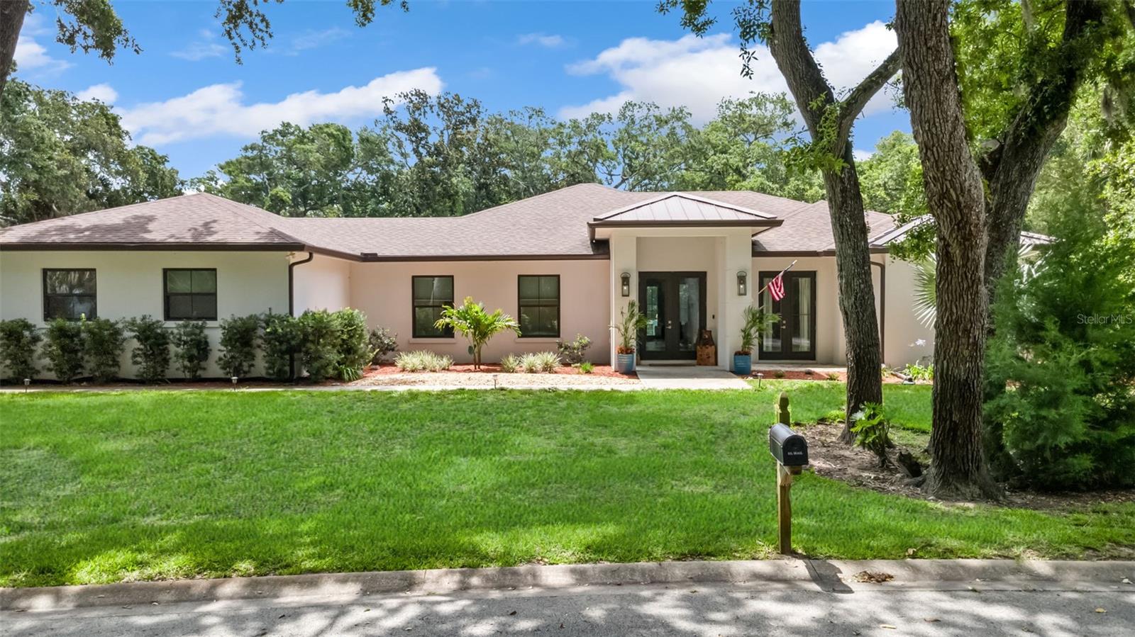 Nestled on a beautifully manicured acre of park-like grounds. - 14 MERIDIAN HOME LN, PALM COAST