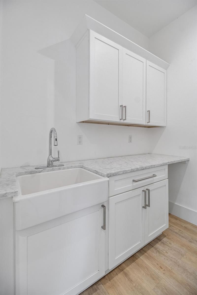 Generously sized laundry room - 14 MERIDIAN HOME LN, PALM COAST