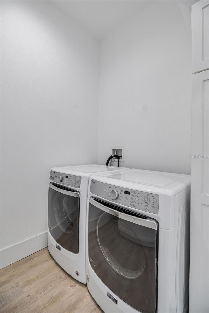 Generously sized laundry room designed for convenience - 14 MERIDIAN HOME LN, PALM COAST
