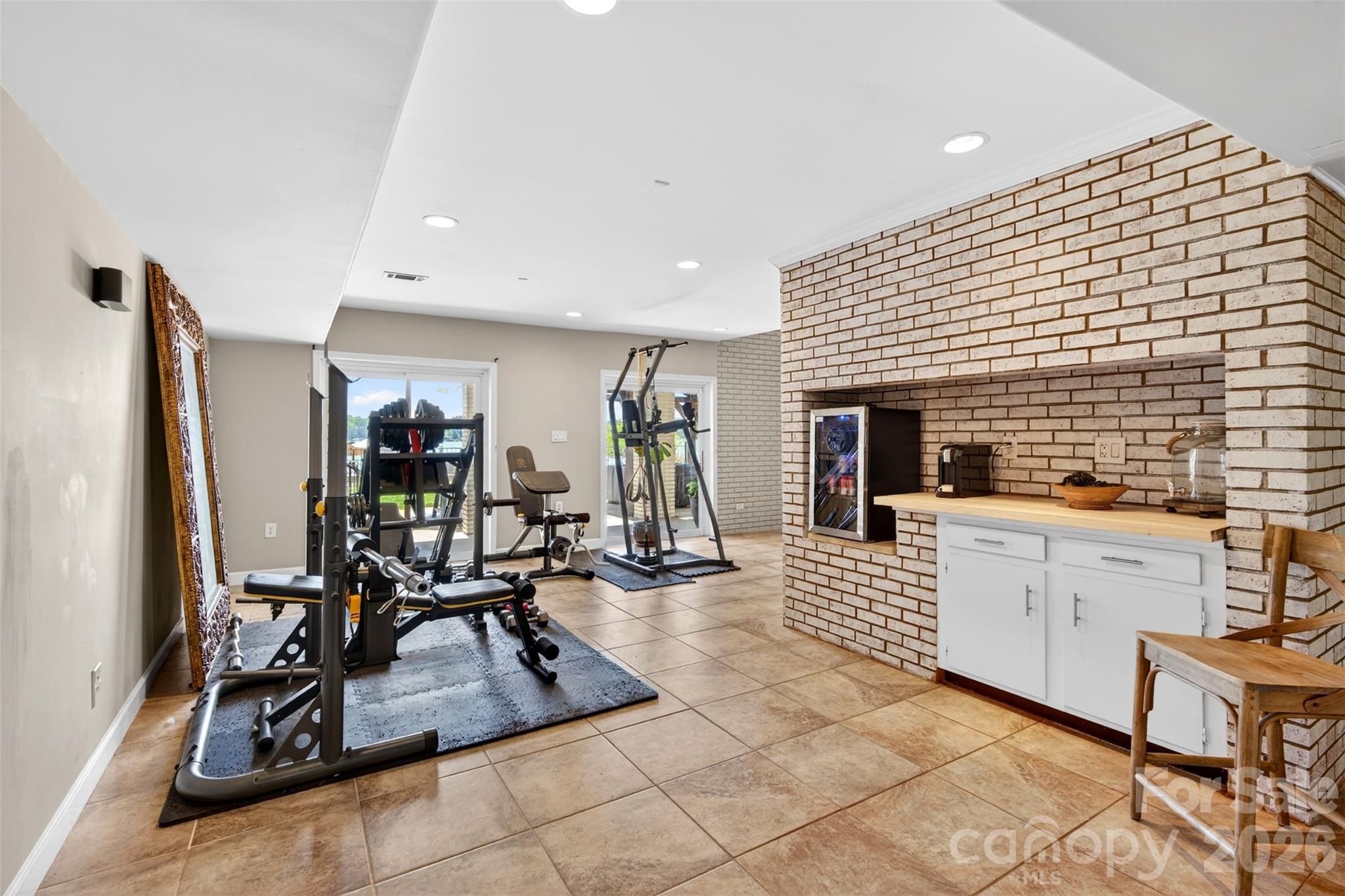 gym area finished walk out basement - 615 Kenway Loop, Mooresville