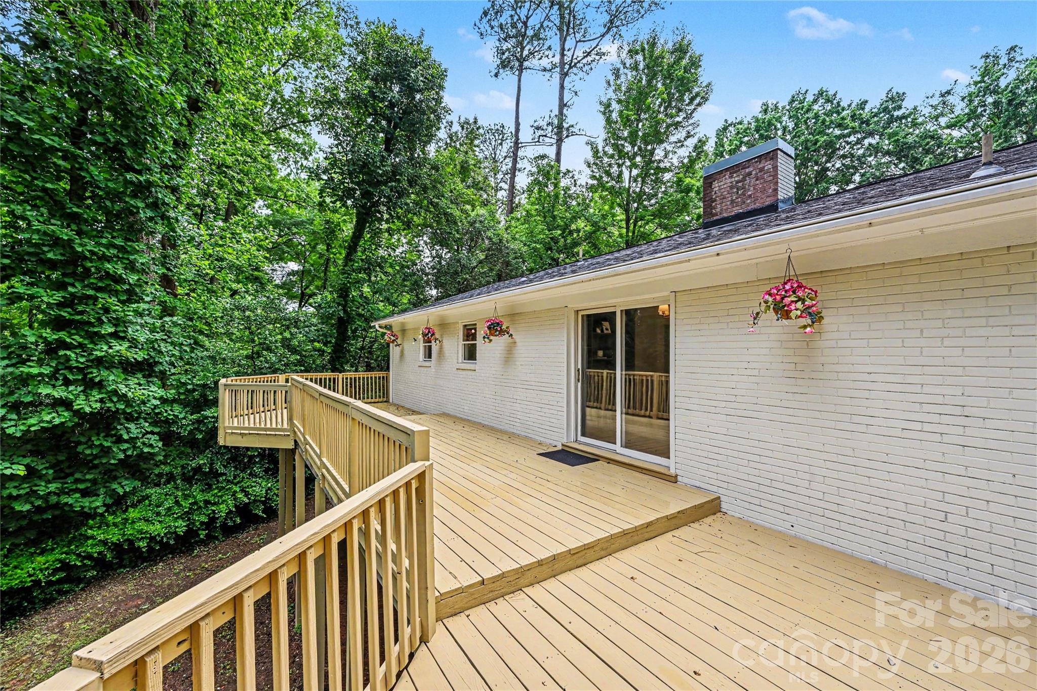 Multiple seating and entertaining areas make this impressive outdoor living space an extension of the home. - 716 Grandview Drive NE, Concord