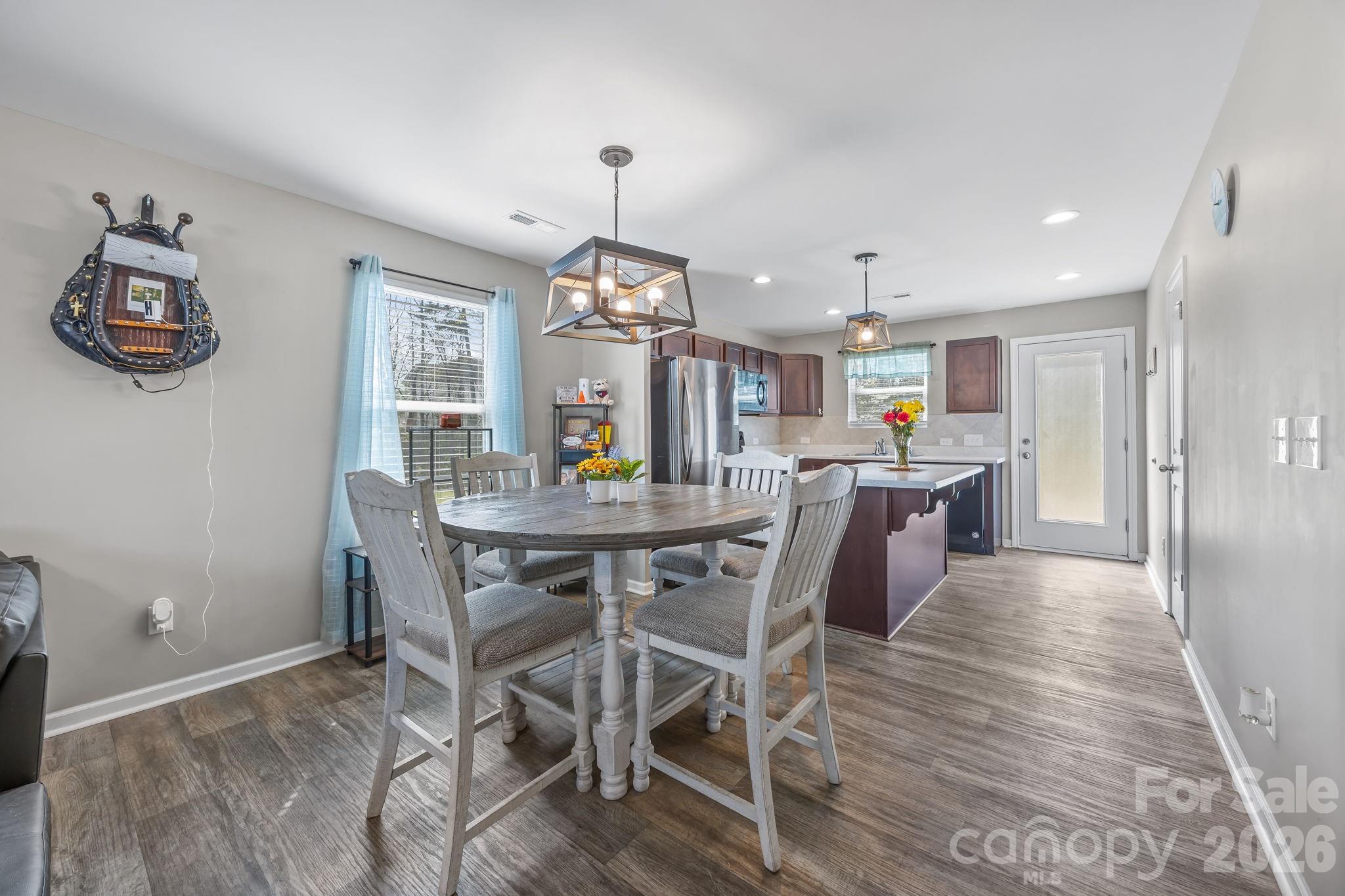 LVP flooring is ln the main living area plus the stairs, stairway and the primary bedroom - 813 Yorkshire Drive, Albemarle
