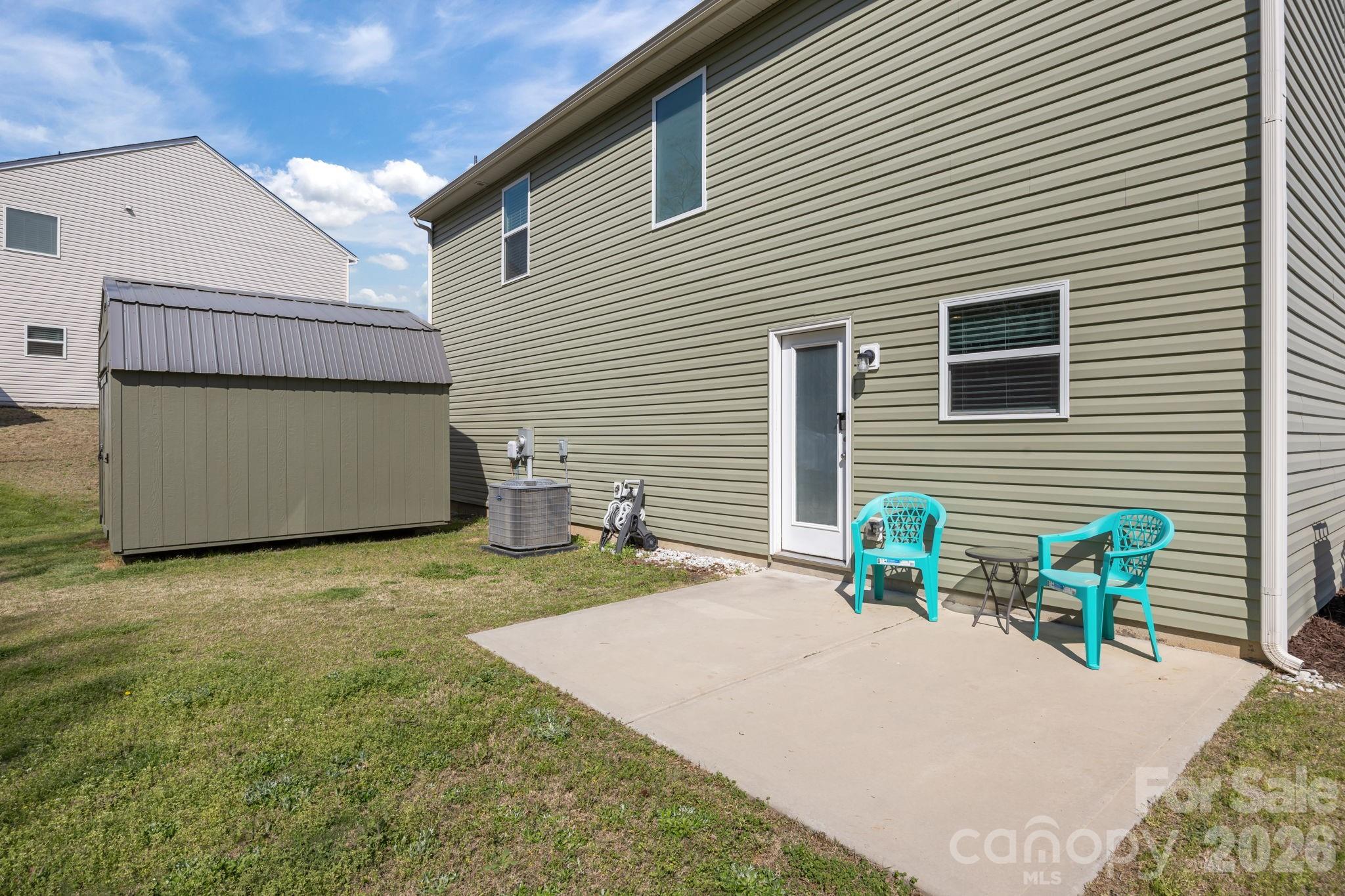 Patio for grilling in the backyard! Nice large yard (0.44 acres) for all your outdoor activities including gardening, disc golf, and cornhole. Add a firepit, a gazebo, outdoor kitchen and make an outdoor entertainment area! - 813 Yorkshire Drive, Albemarle