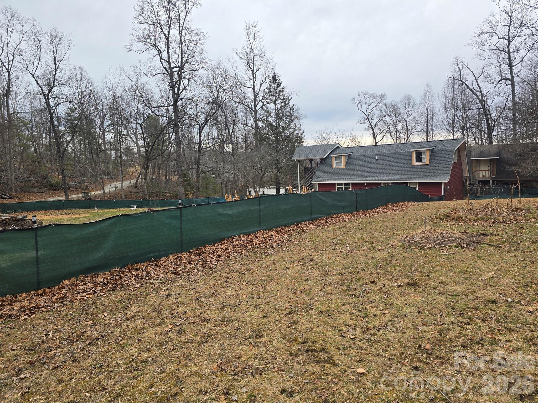 View looking at upstairs and downstairs Units from the RV pad.  Rent out the space for additional income - 1480 Davis Mountain Road, Hendersonville