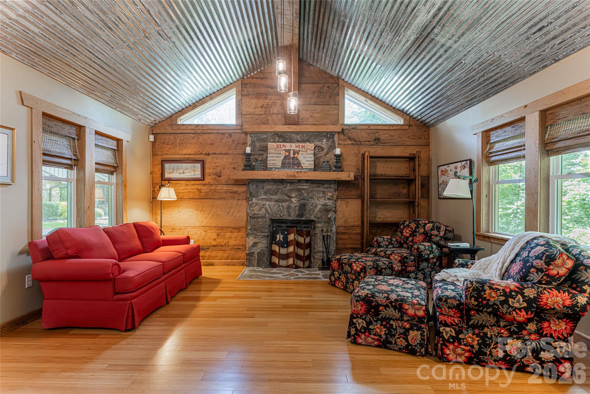 Guest Cottage with a stone fireplace. All Trim and accent walls are wormy chestnut - 711 Shawnee Trail, Asheville