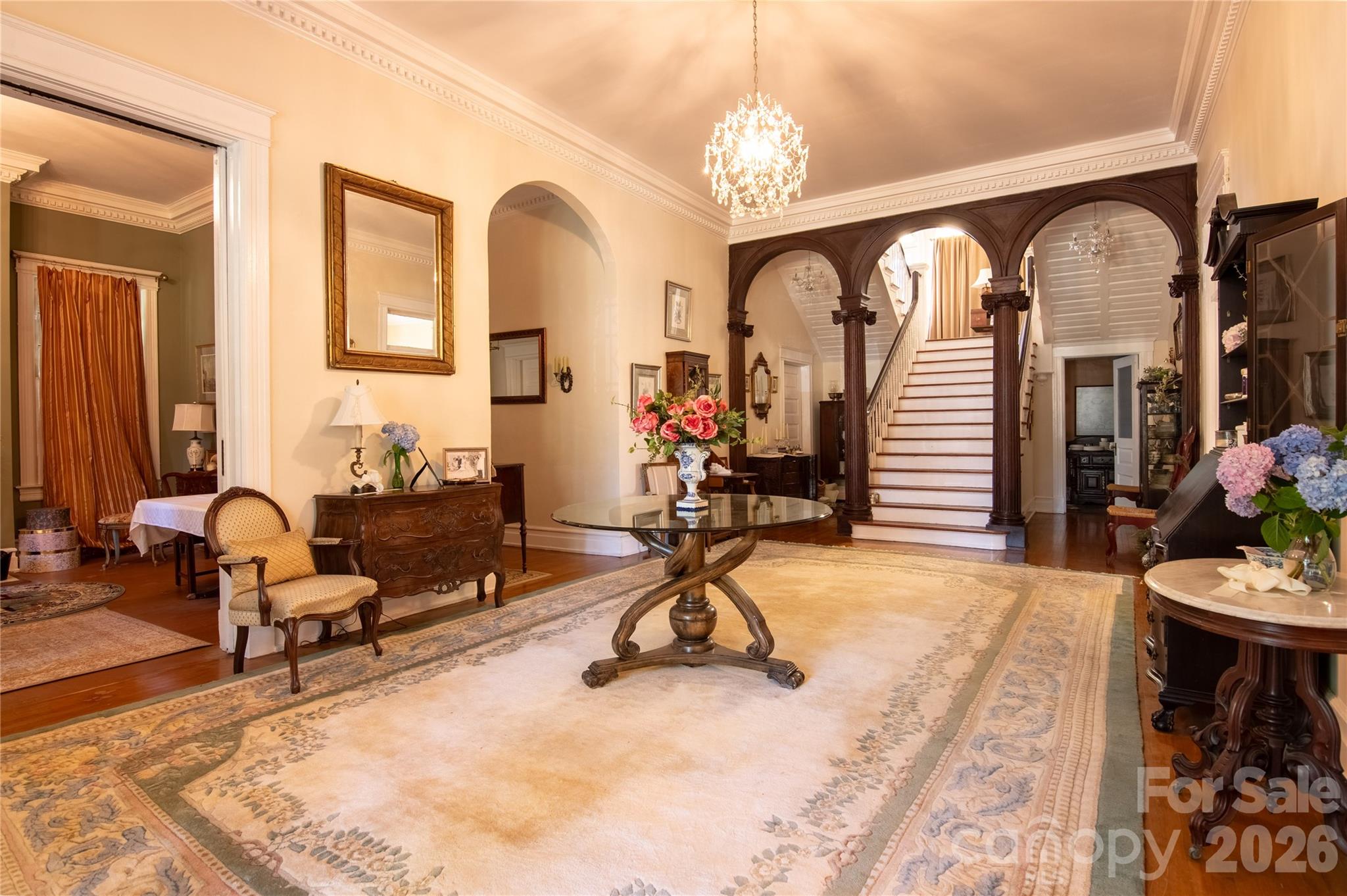 Large entry hall inviting you to explore all the great rooms in this historic jewel. - 413 S Washington Street, Shelby