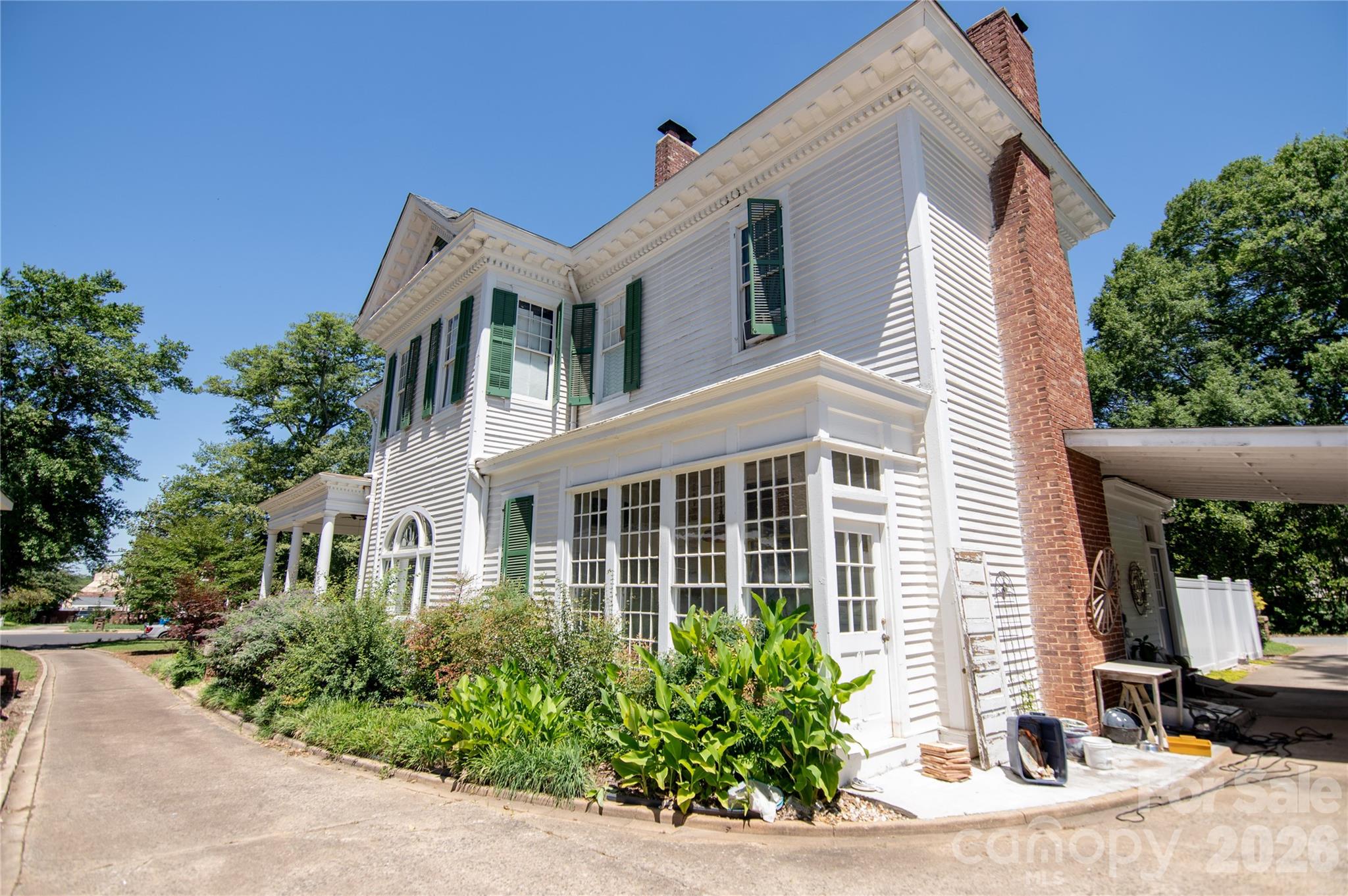 Right Rear View showing enclosed garden porch. - 413 S Washington Street, Shelby