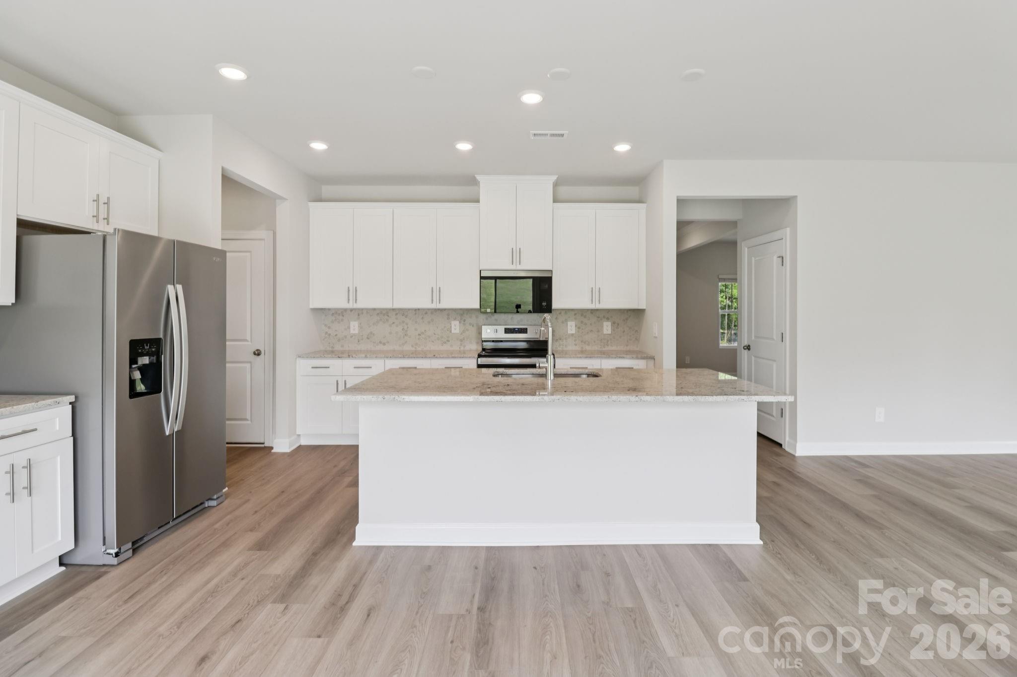 Photo is not of the actual home, but is an inspirational photo of builder’s model home and may depict options, furnishings, and/or decorator features that are not included - 104 Frontiersman Drive, Mocksville