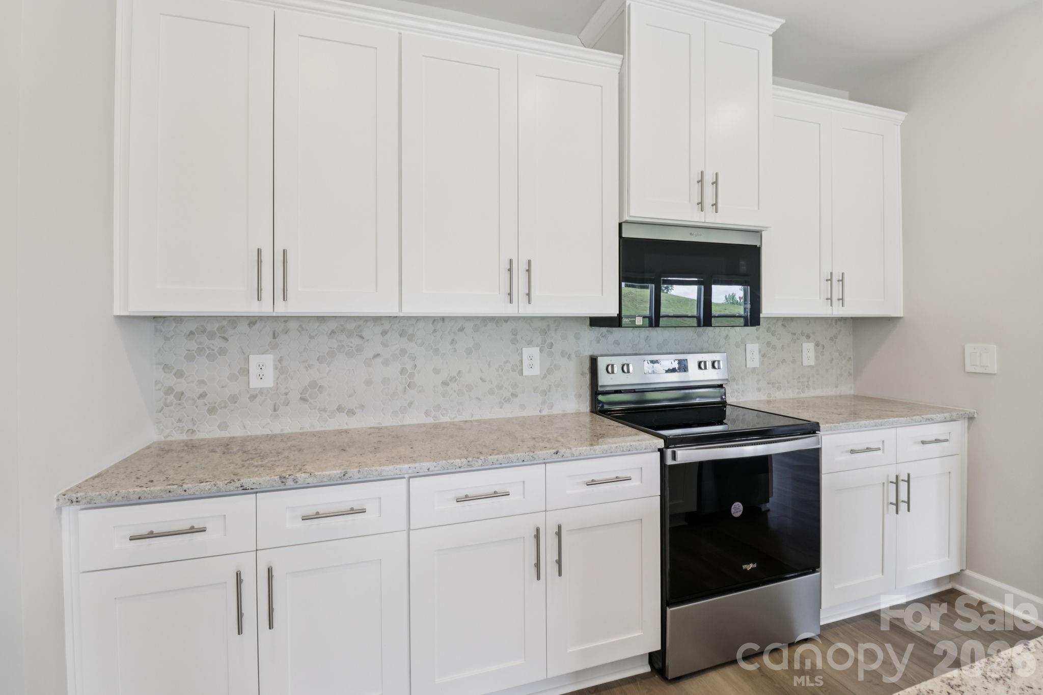 Photo is not of the actual home, but is an inspirational photo of builder’s model home and may depict options, furnishings, and/or decorator features that are not included - 104 Frontiersman Drive, Mocksville