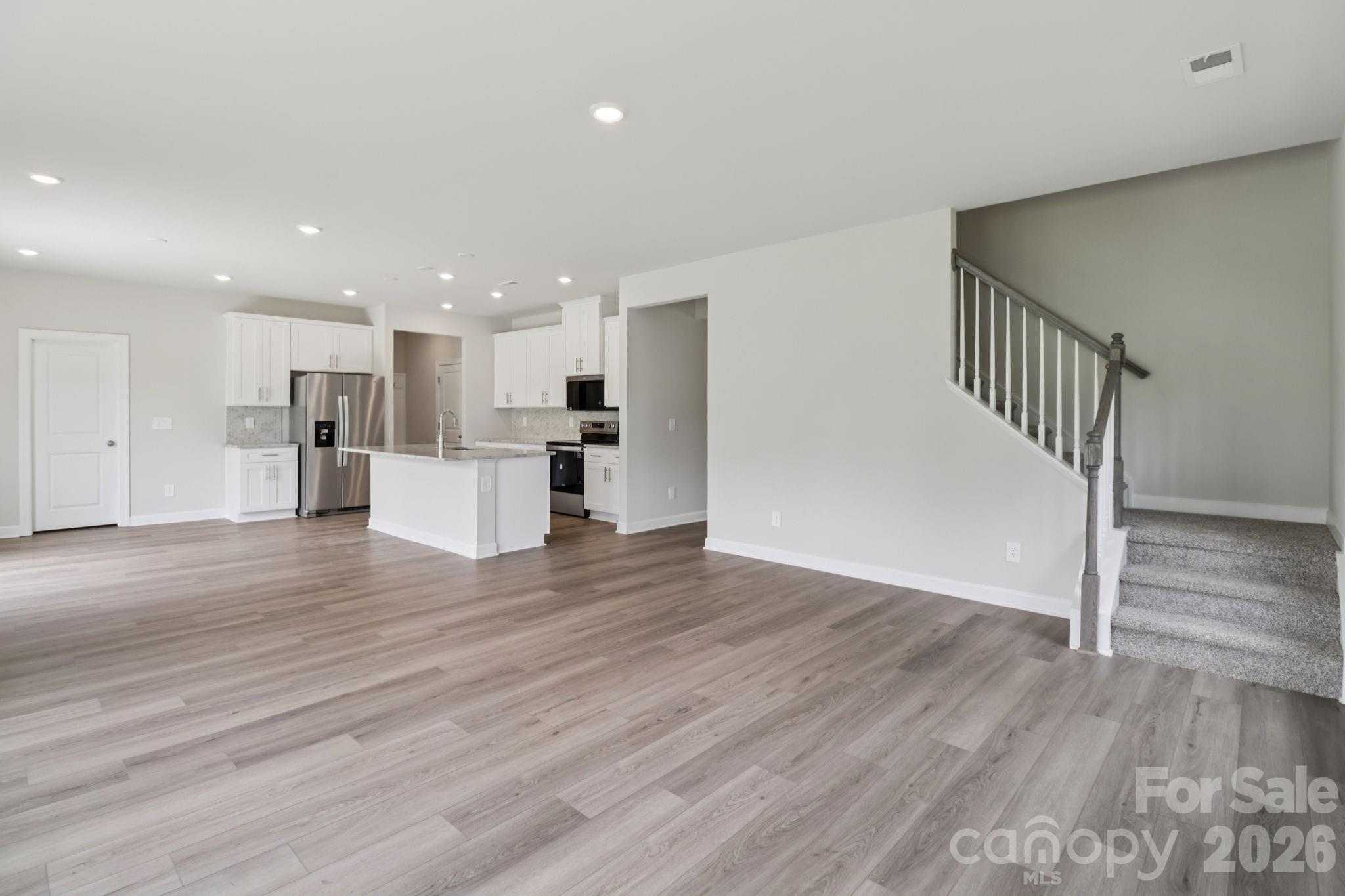 Photo is not of the actual home, but is an inspirational photo of builder’s model home and may depict options, furnishings, and/or decorator features that are not included - 104 Frontiersman Drive, Mocksville