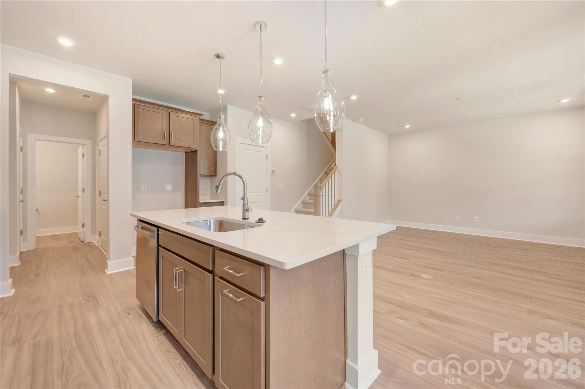 Kitchen island with storage and large single bowl stainless steel sink - 316 Ardmore Drive, Belmont