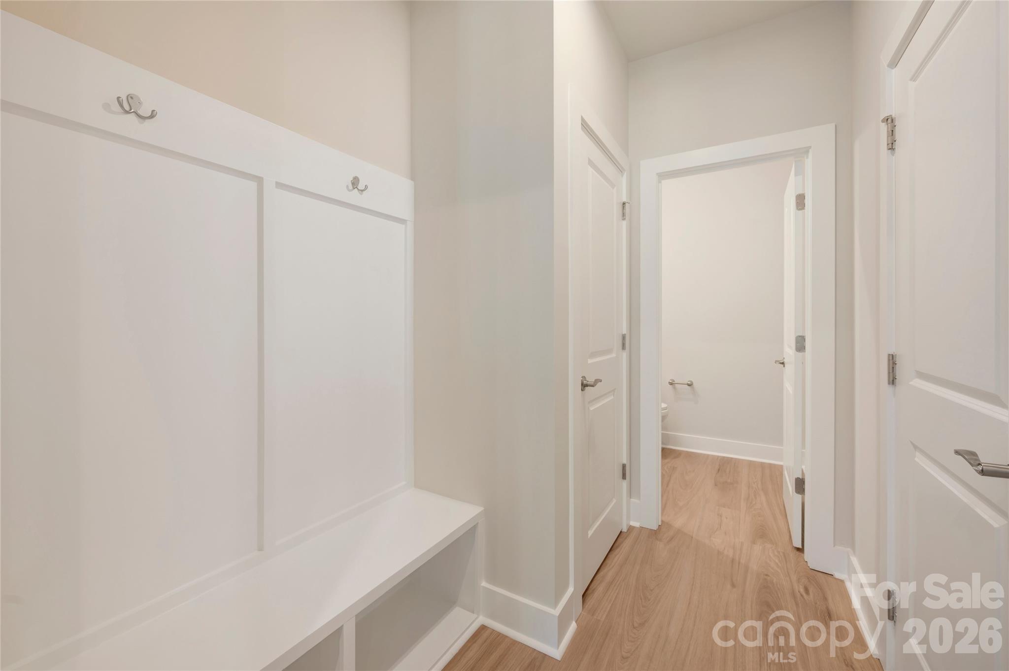 Drop zone and first floor powder room - 316 Ardmore Drive, Belmont
