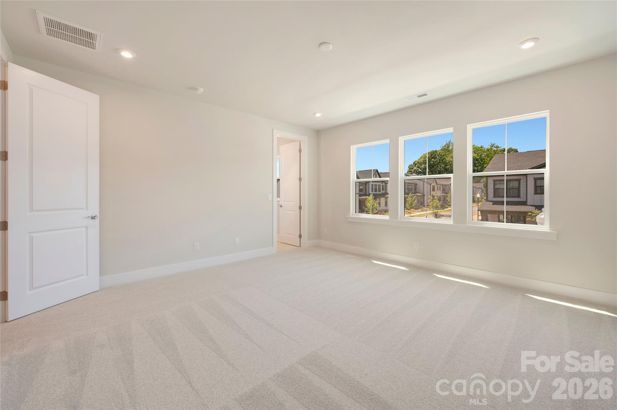 Light filled primary bedroom - 316 Ardmore Drive, Belmont