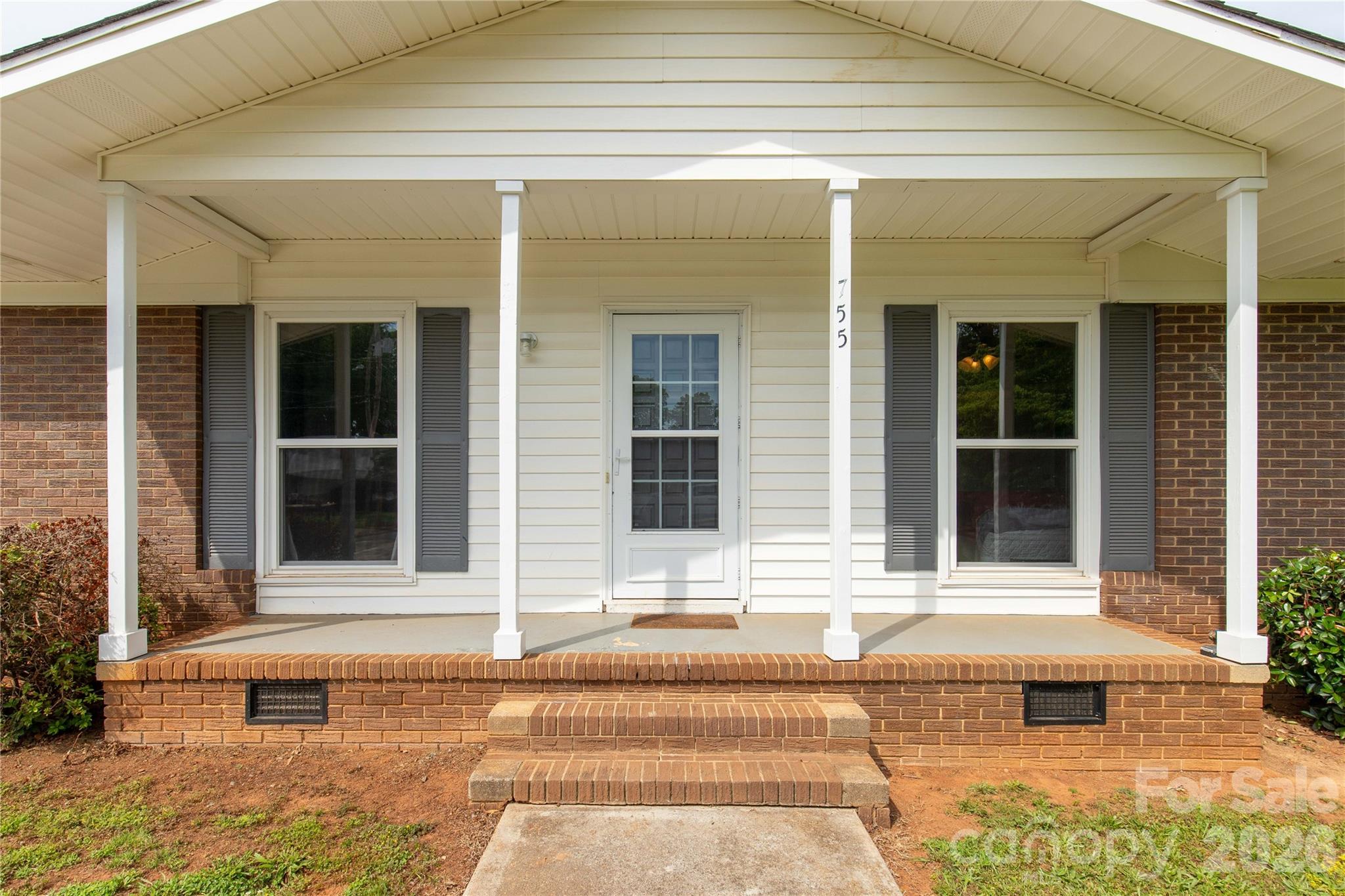 Lovely rocking chair front porch - 755 Emorywood Lane, Rock Hill
